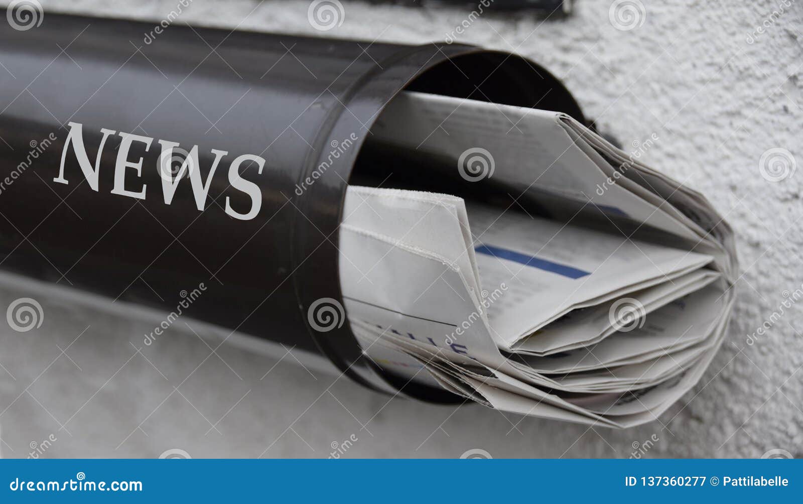 Newspapers in a mailbox stock image. Image of issues 137360277