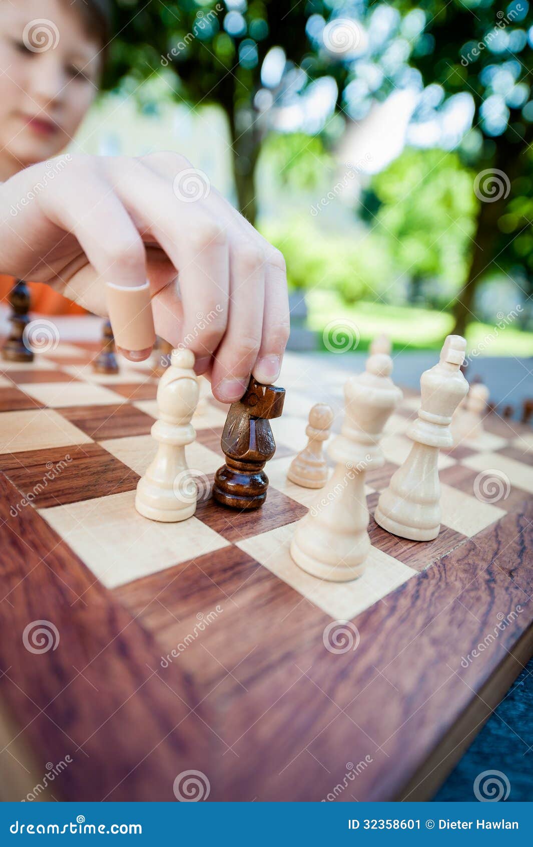 A chess player making his next chess move Stock Photo - Alamy