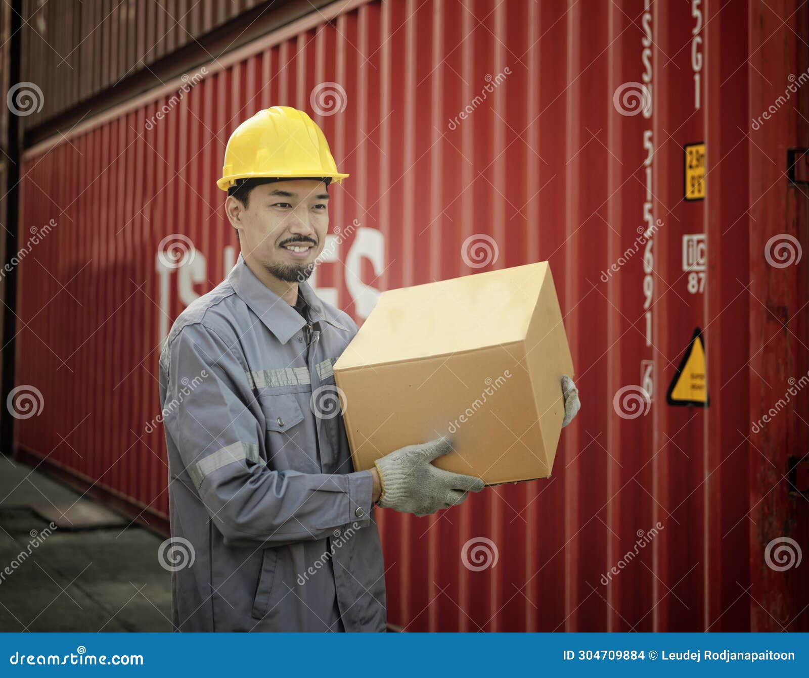 ngineer worker hold cardboard box packaging on product quality