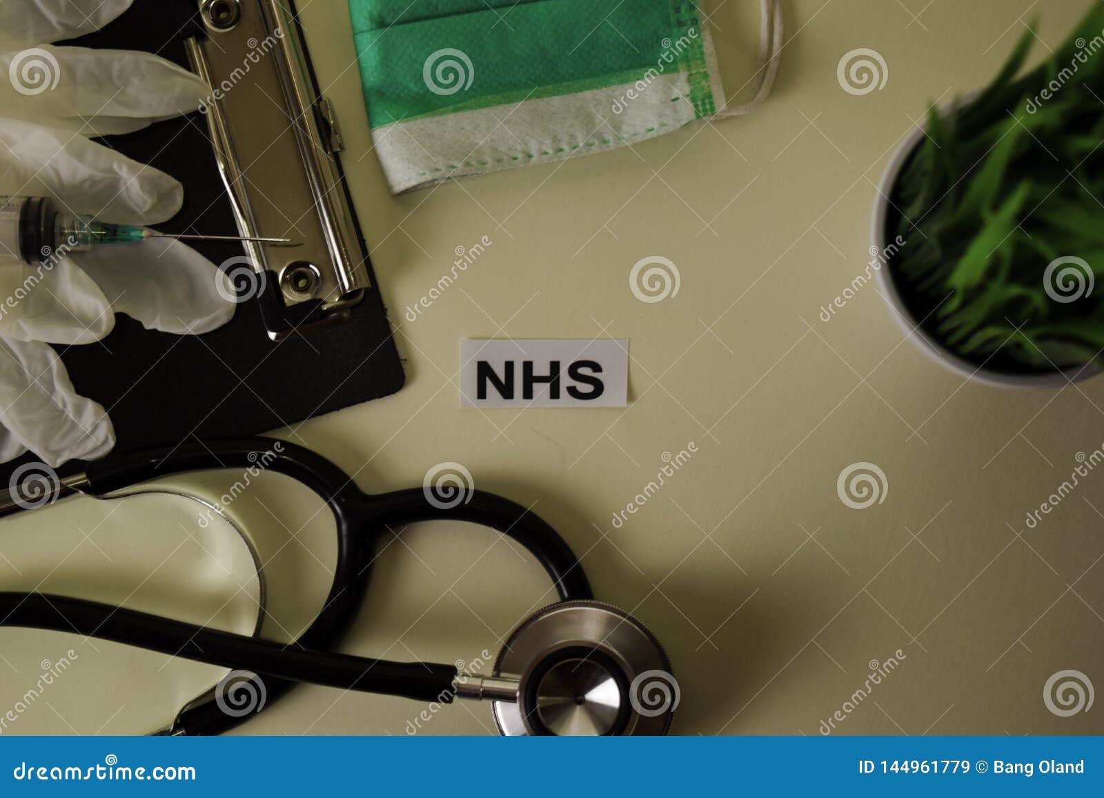 nhs with inspiration and healthcare/medical concept on desk background