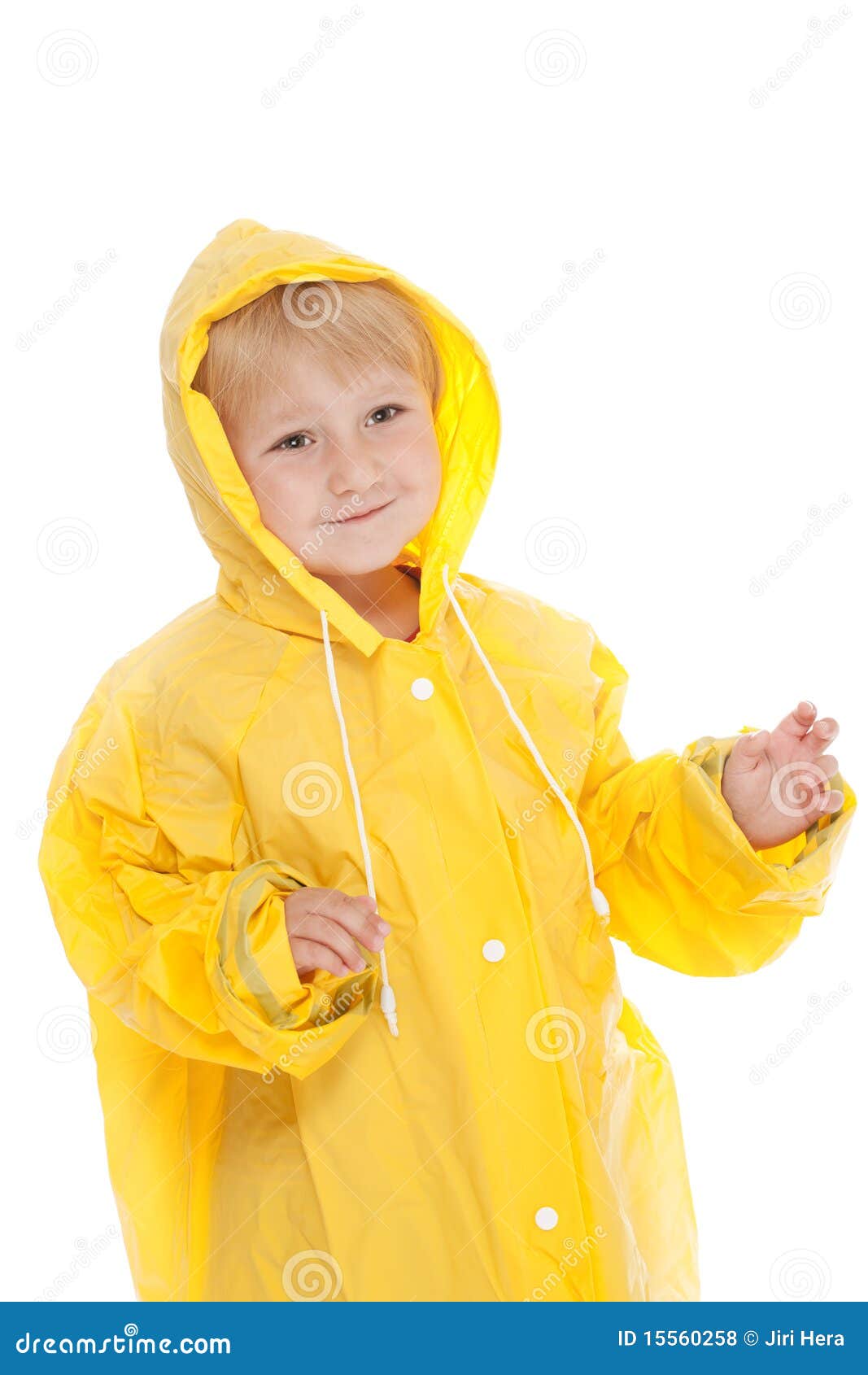 Niño Con El Impermeable Amarillo Foto de archivo - Imagen de juego