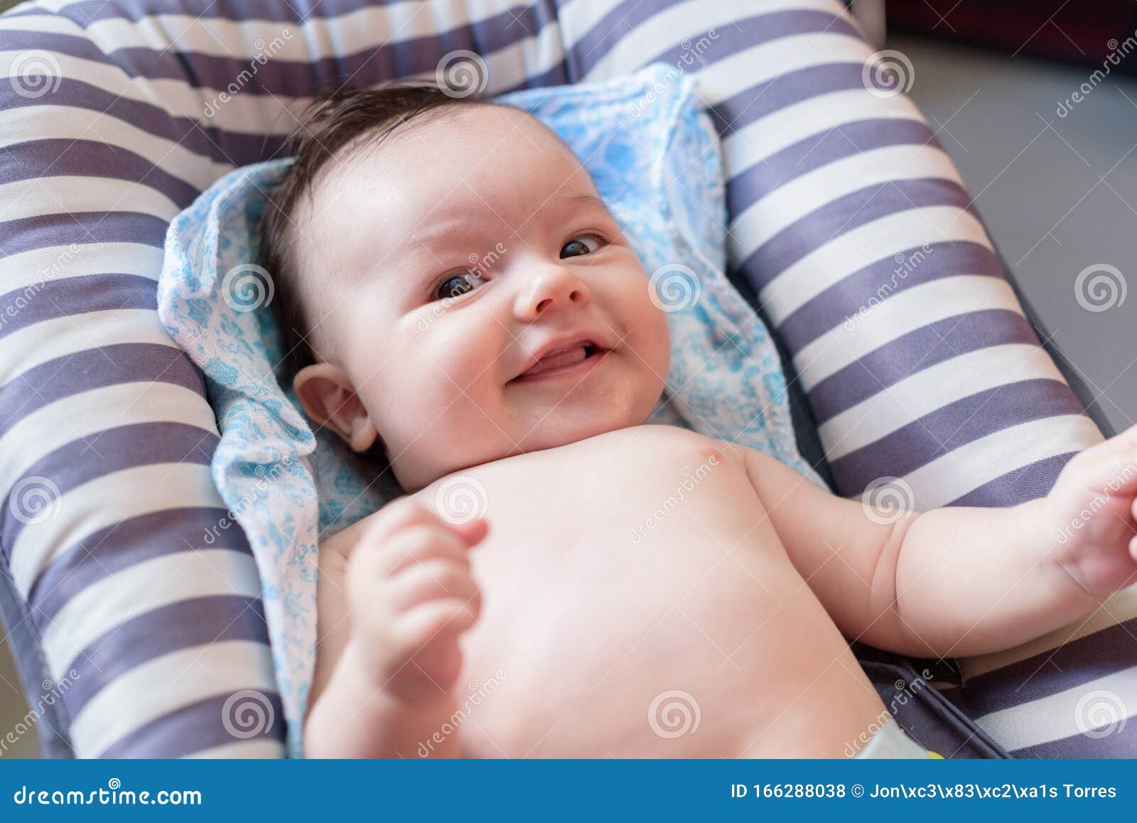 nice and cheerful baby in hammock for babies of rallas