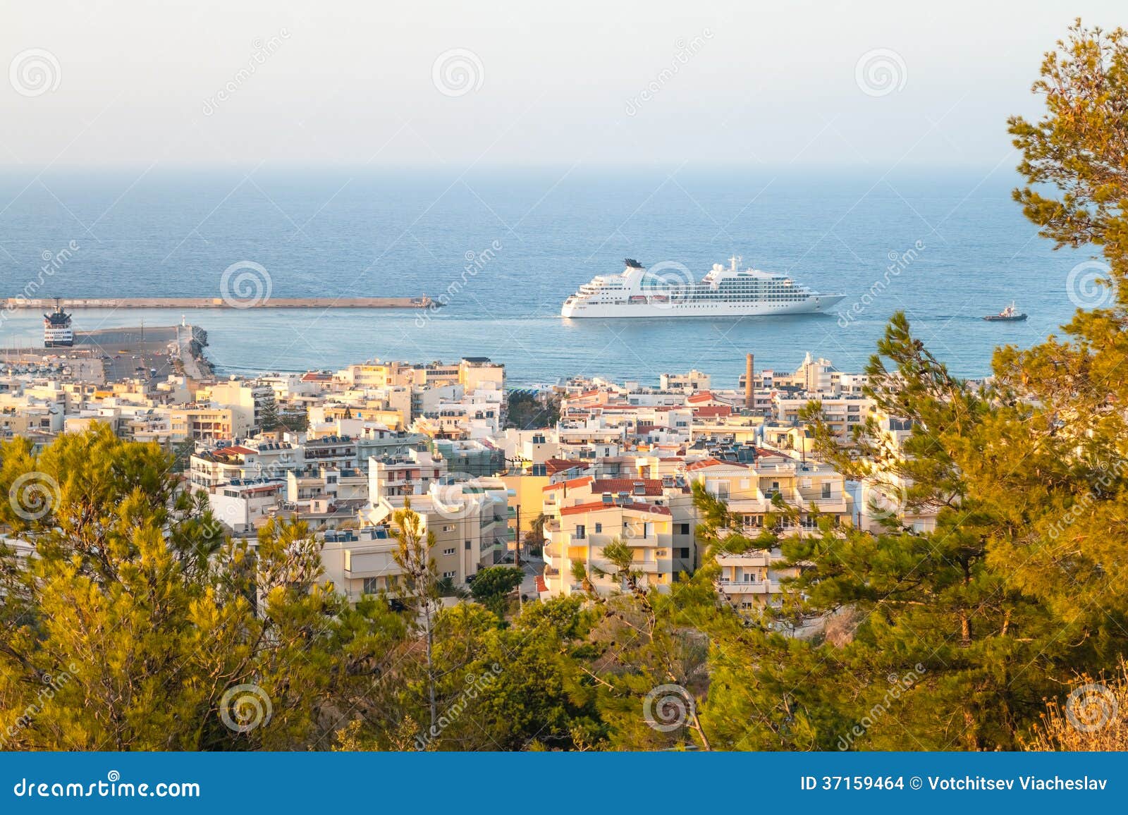 Nice city view on sea and big ship in Crete. Nice city view on sea and big ship in sunny day, Crete, Greece