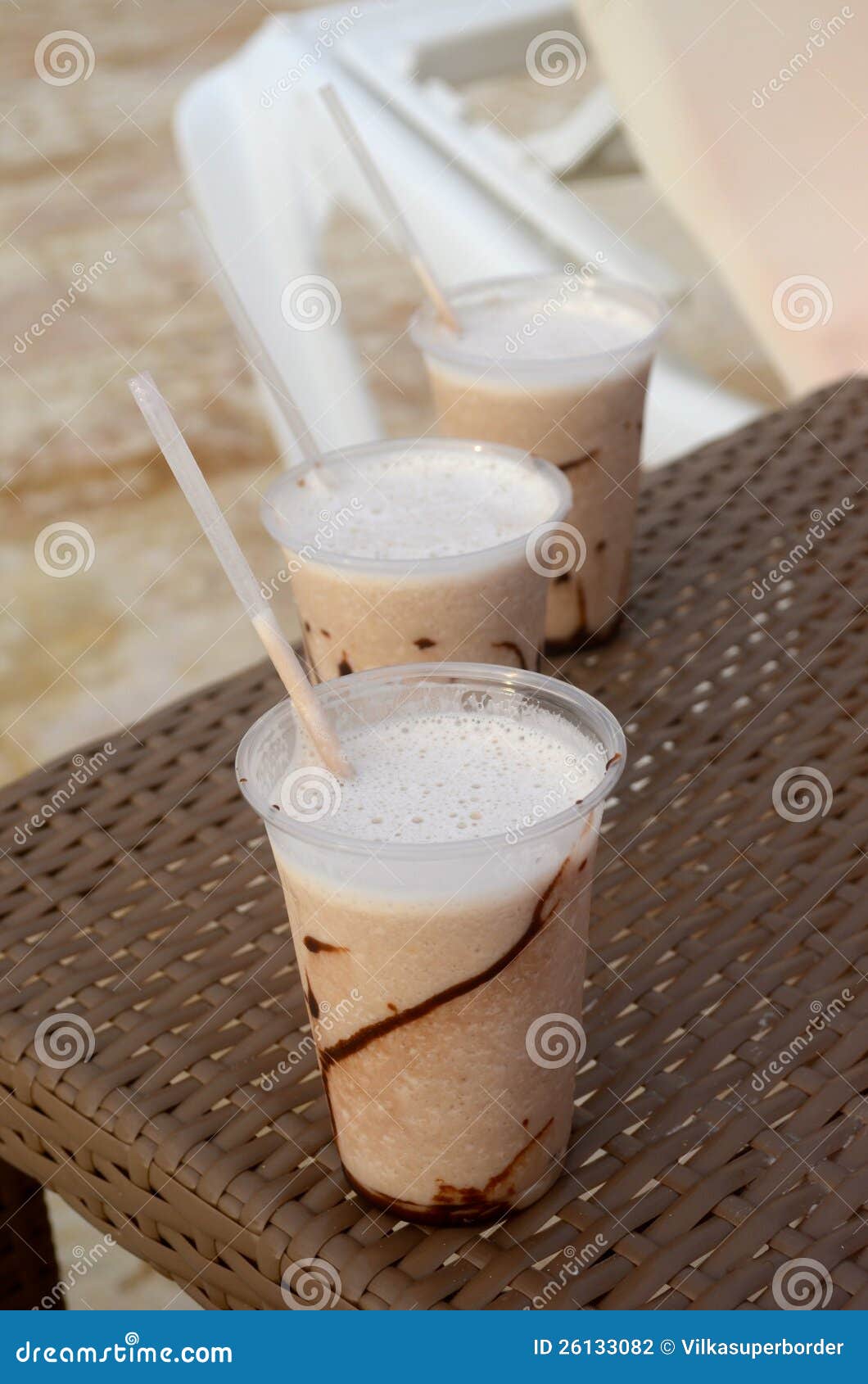 Nice cocktails at the pool stock photo. Image of brown 26133082