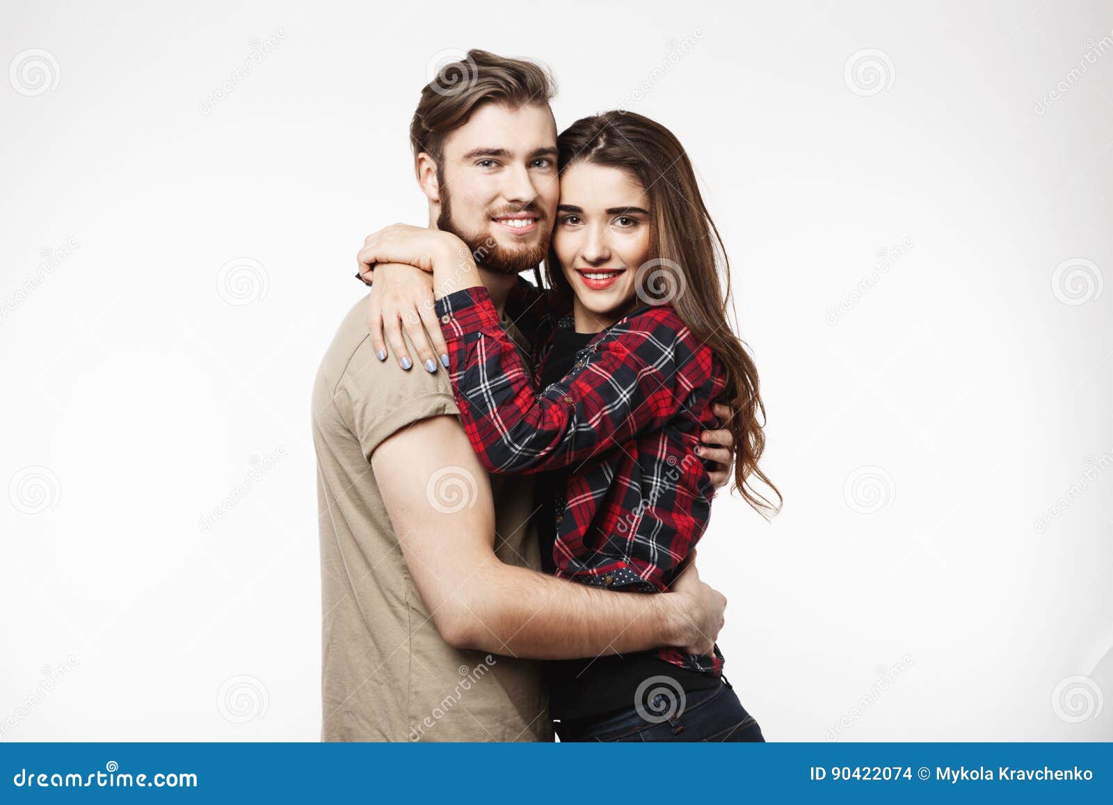Nice Couple Hugging Each Other and Looking at Camera. Stock Photo ...
