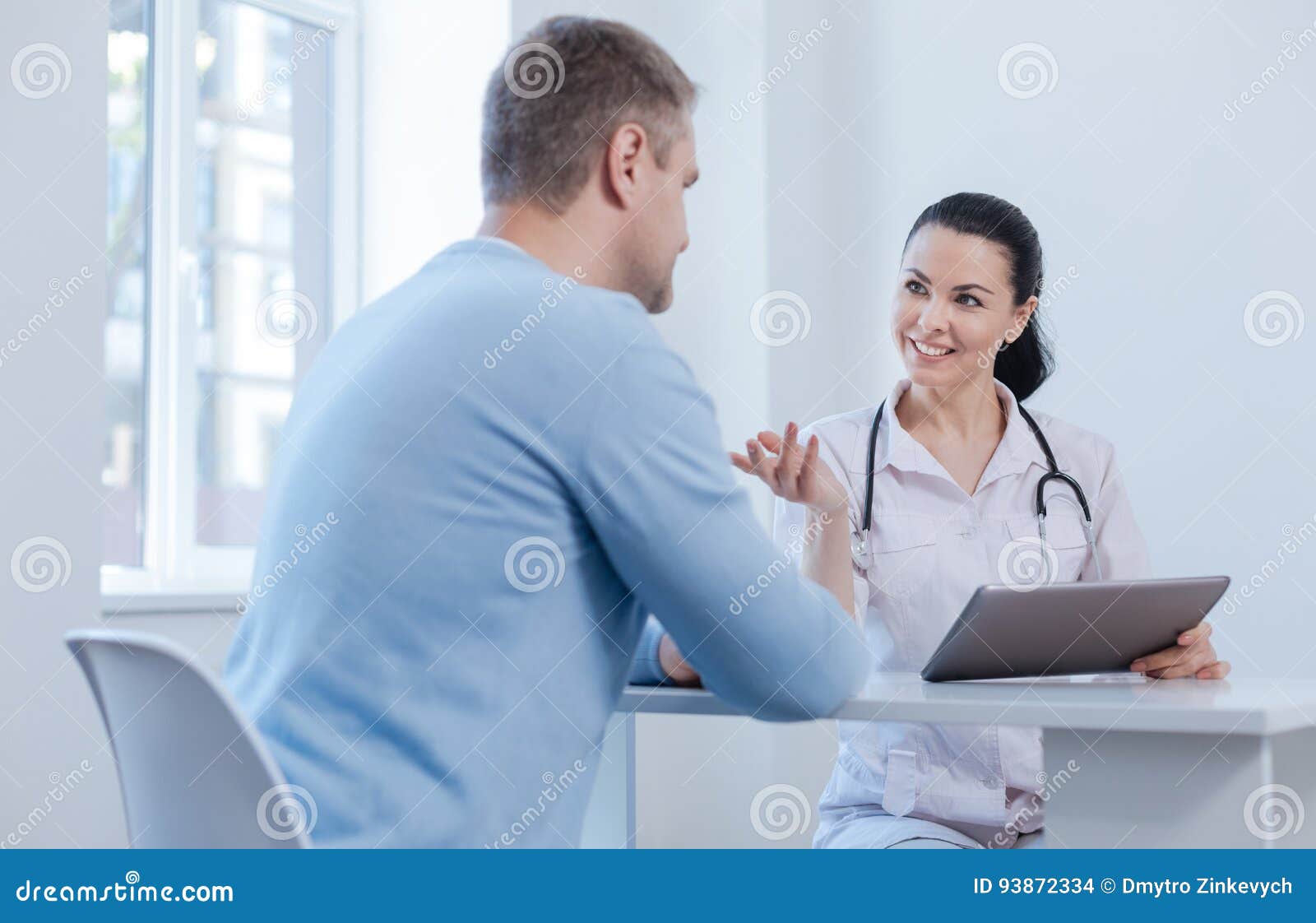 nice doctor enjoying appointment in the hospital