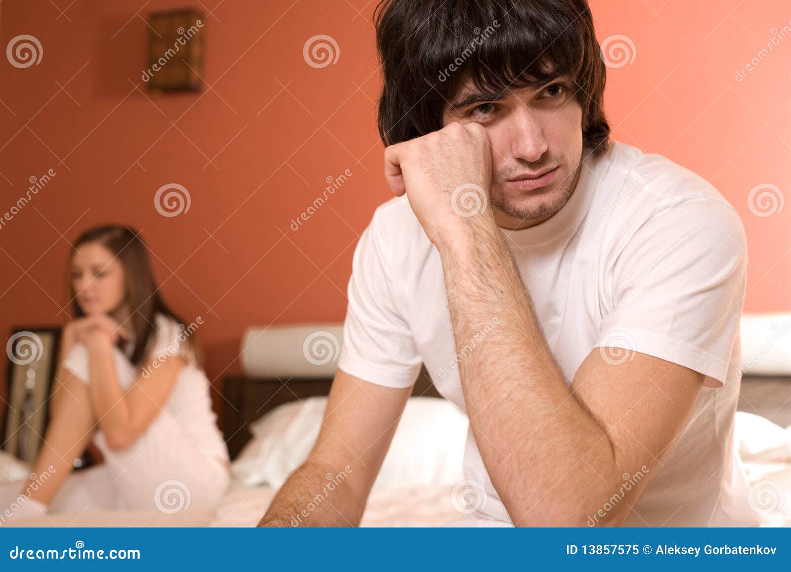 Nice girl and boy on bed stock image. Image of frustration 13857575