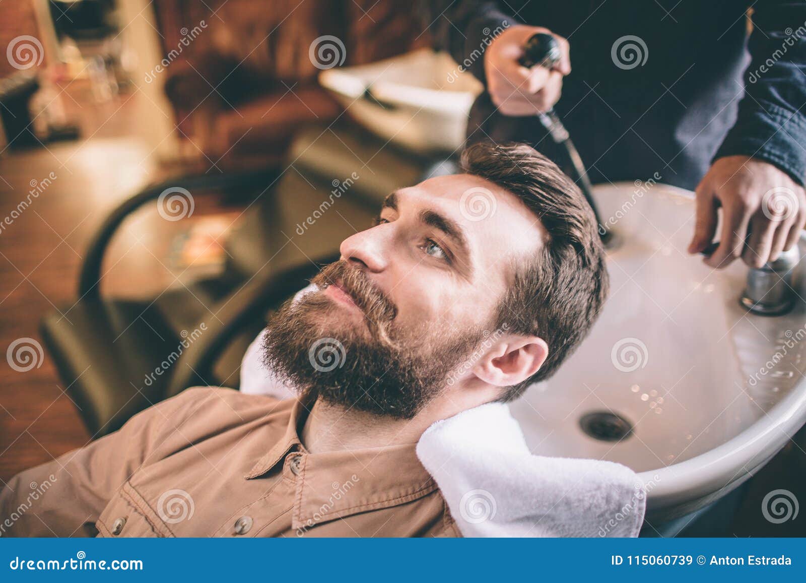 Nice Guy Is Having Some Care About His Hair The Hairdresser Is