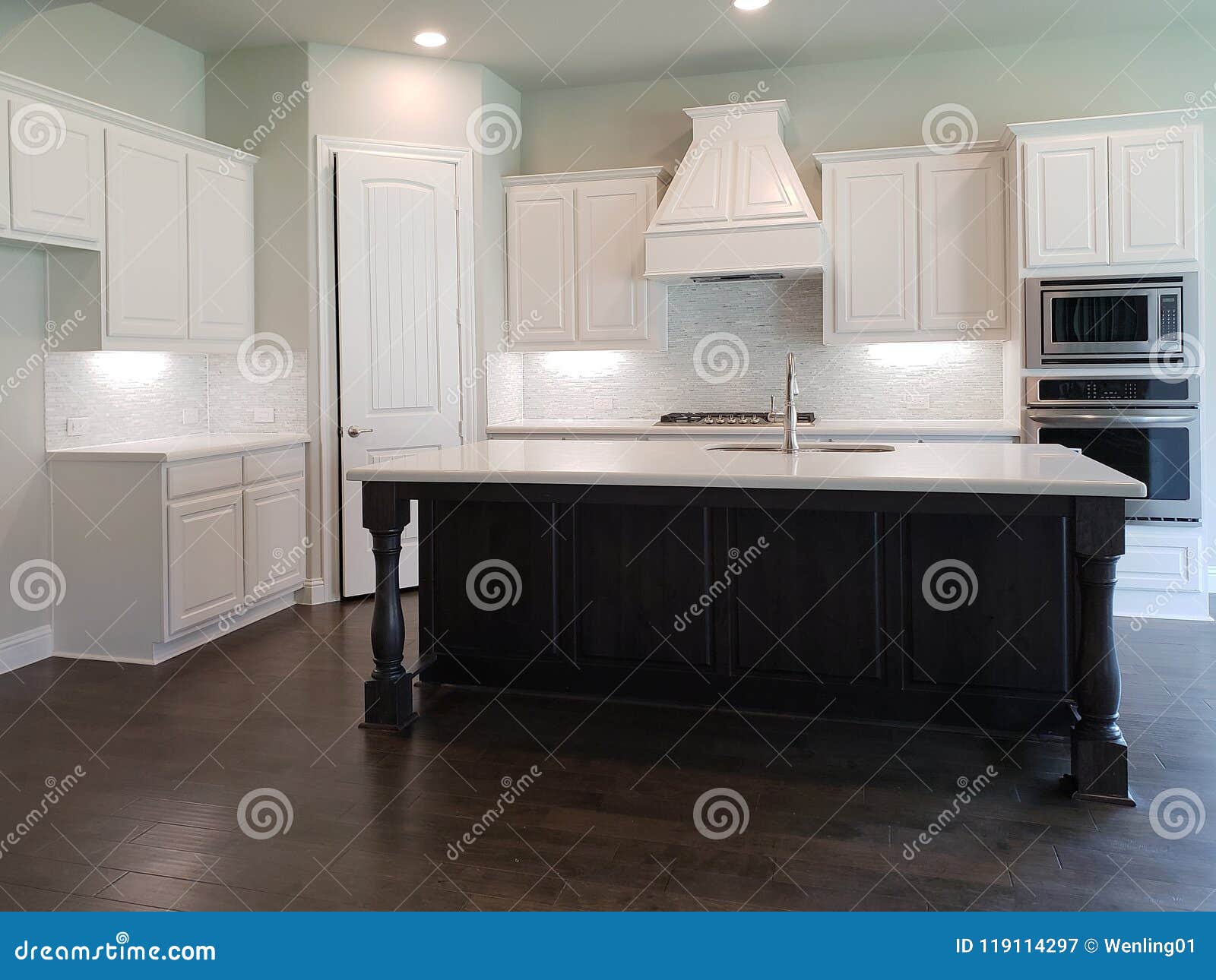 modern kitchen with island counter in a new house