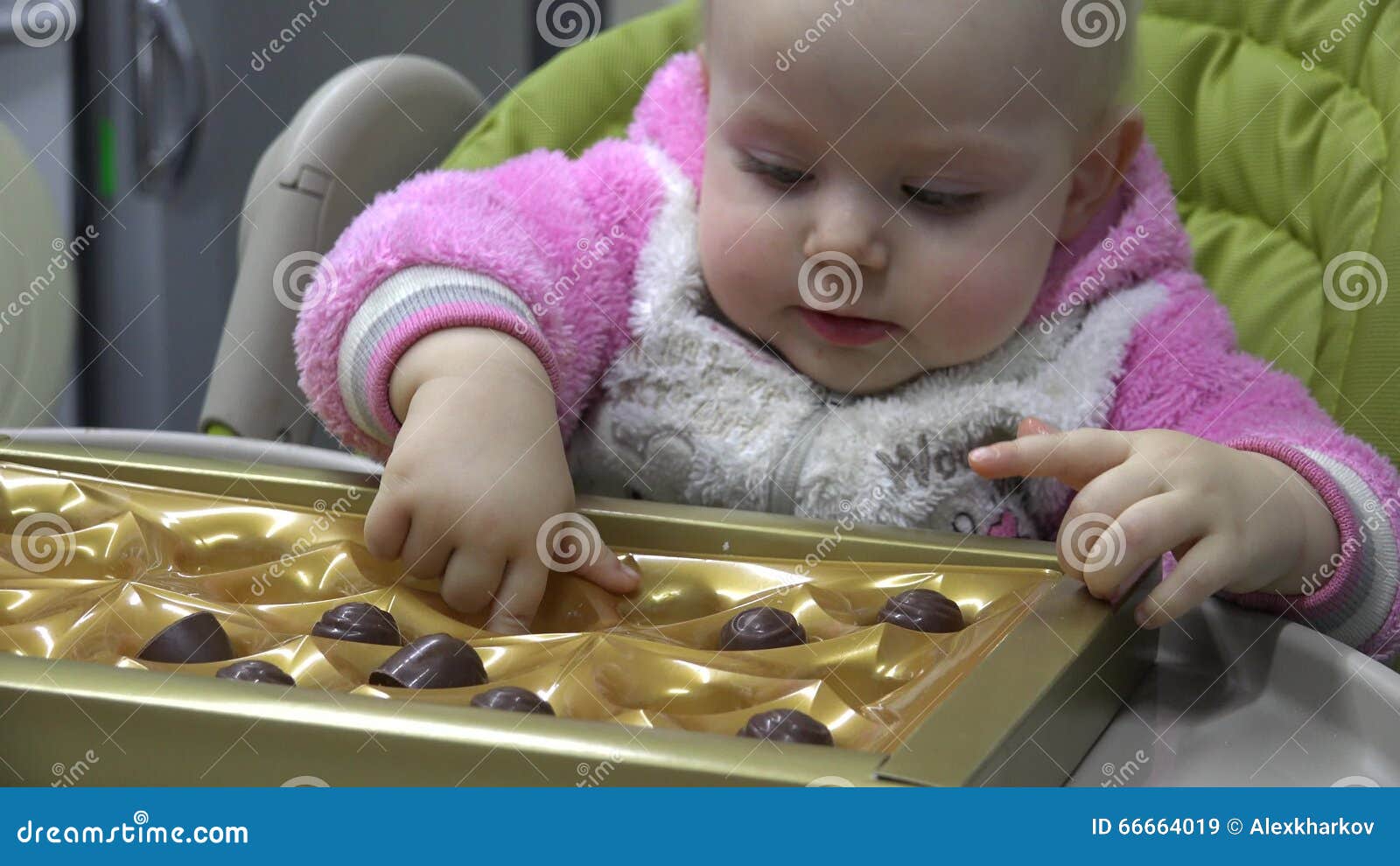 Nice Little Baby and Candy.Closeup . 4K UltraHD, UHD Stock Video