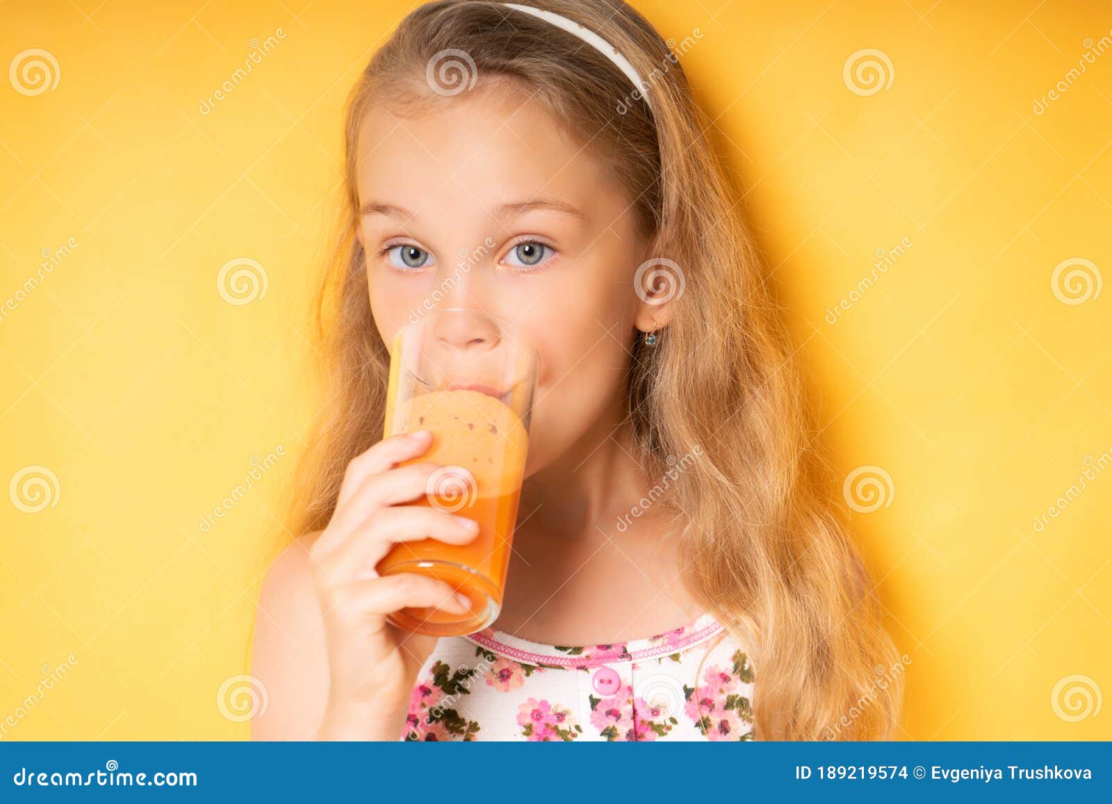 Nice Little Girl with Blond Hair Enjoying Carrot Juice with Great Pleasure Showing Beautiful Smile. Close Up Shot Stock Photo - Image of expression, happiness: 189219574 Nice Little Girl with Blond Hair Enjoying Carrot Juice with Great Pleasure Showing Beautiful Smile. Close Up Shot Stock Photo - Image of expression, happiness: 189219574