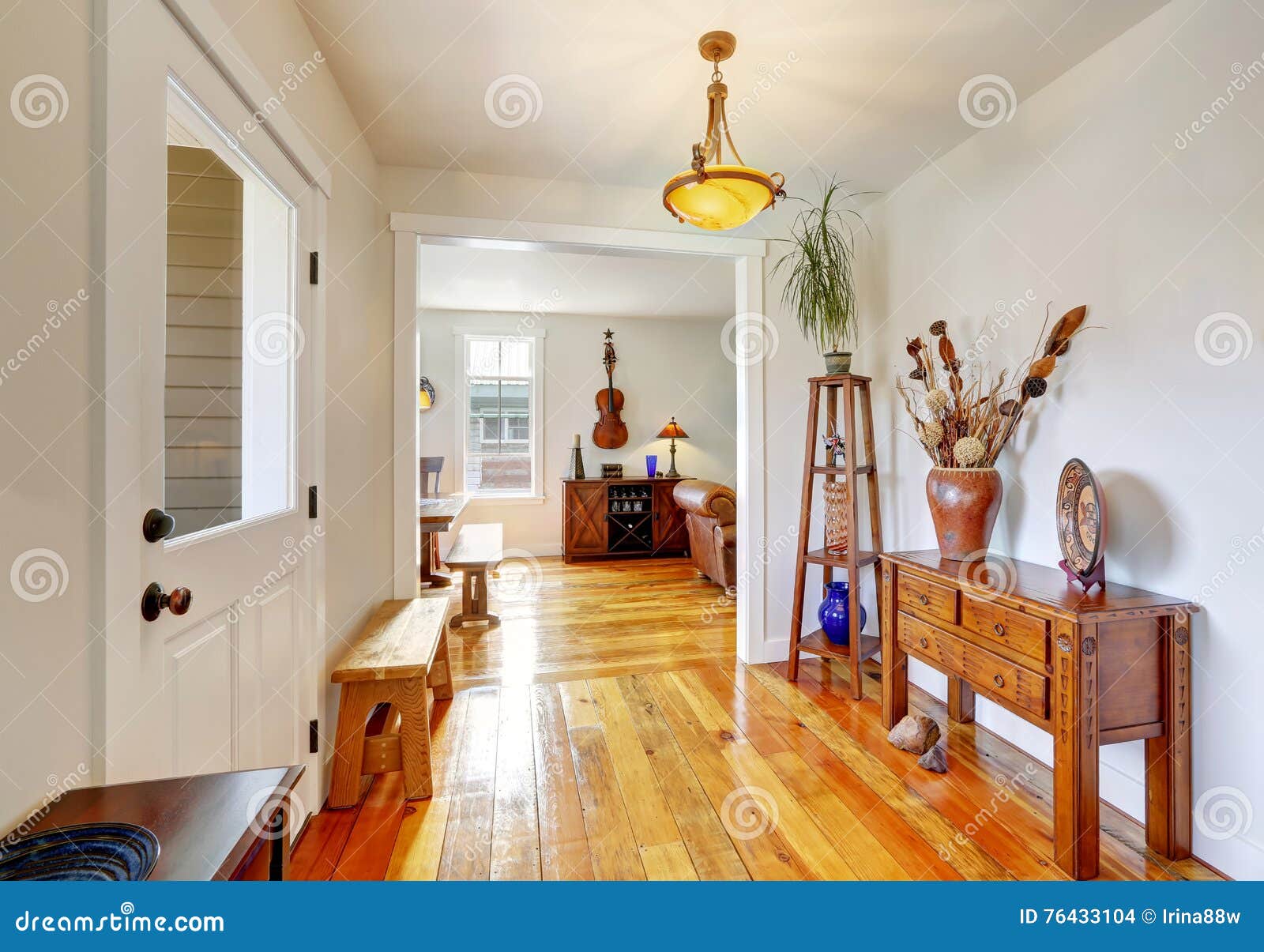 Nicely Decorated Entryway With Vintage Furniture Stock Photo