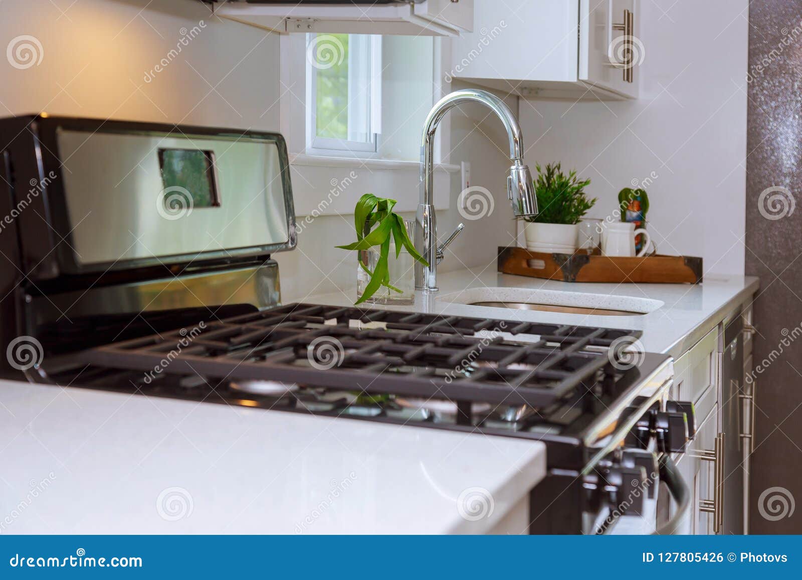 Nicely Remodeled Kitchen With Glossy Granite Counter Tops Paired