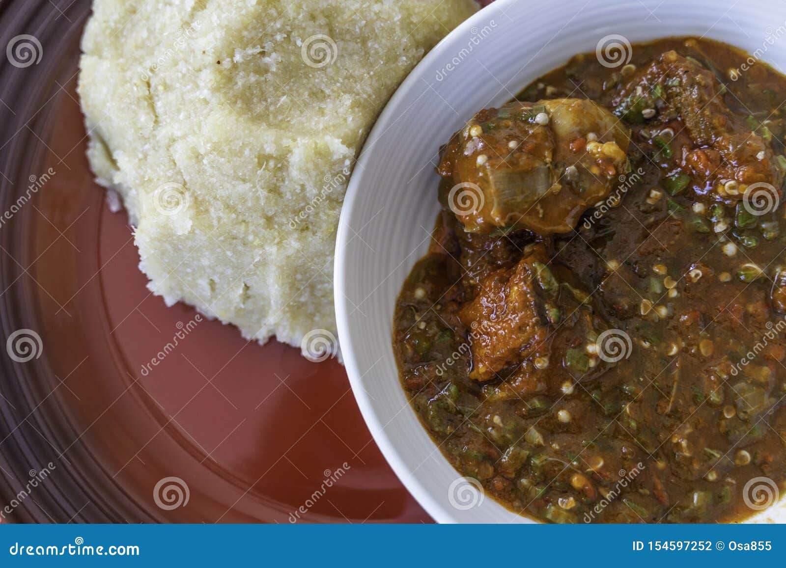 nigerian spicy okro and pepper stew served with eba ready to eat