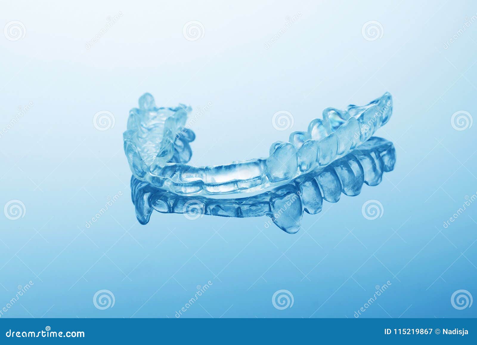 night dental guard by bruxism on blue background