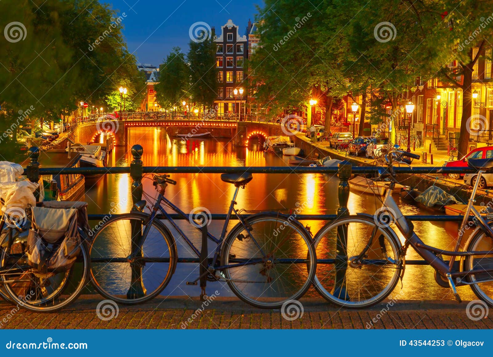 night illumination of amsterdam canal and bridge