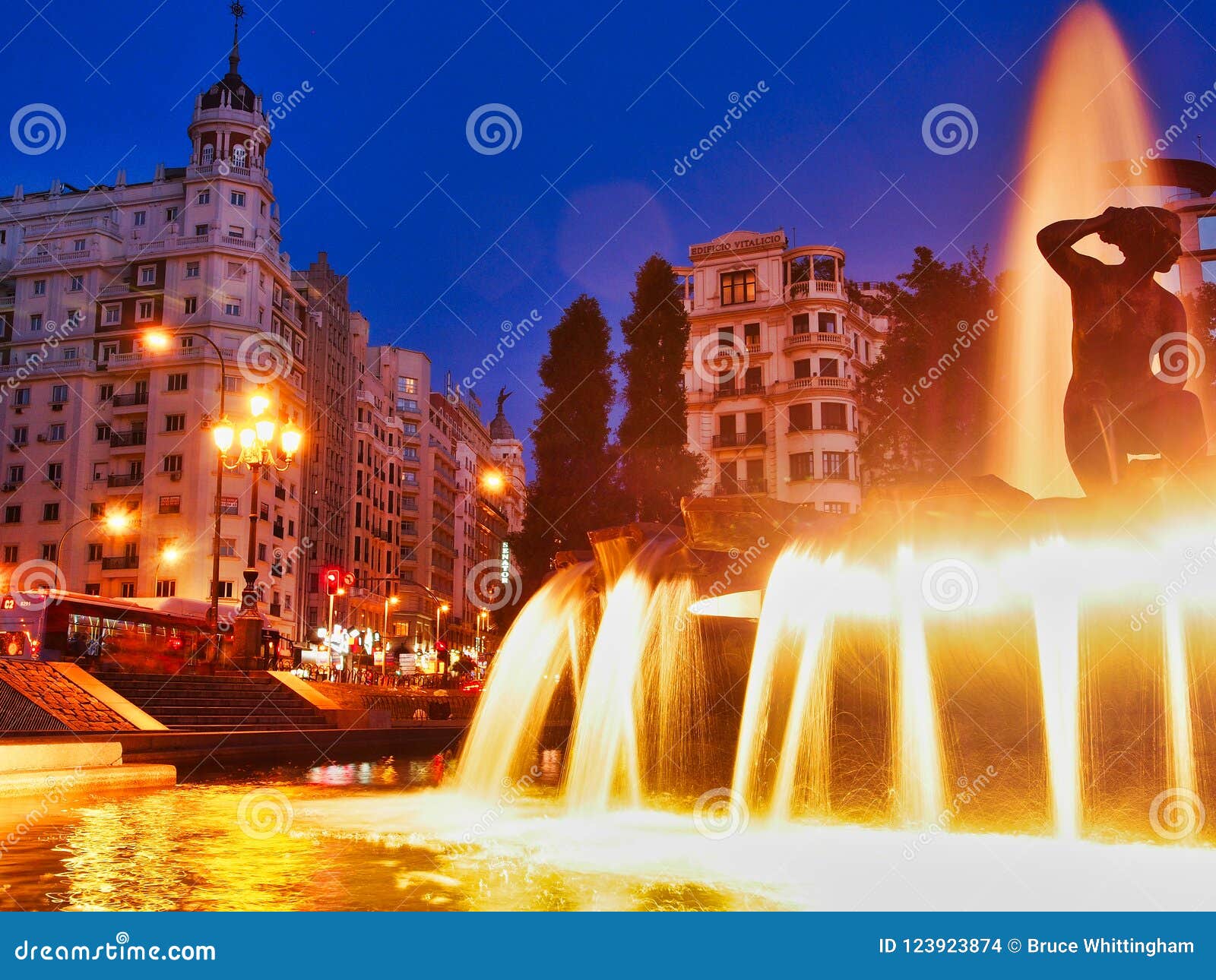 night light reflections in fountain, plaza de espana, madrid, spain