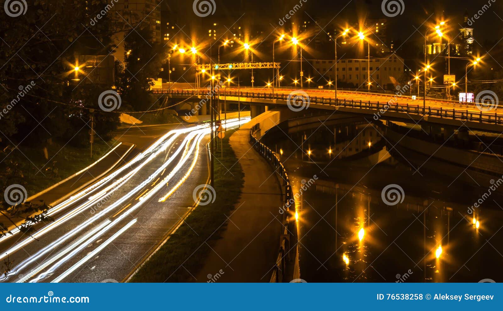 Night motion on boardwalk stock photo. Image of blue 76538258