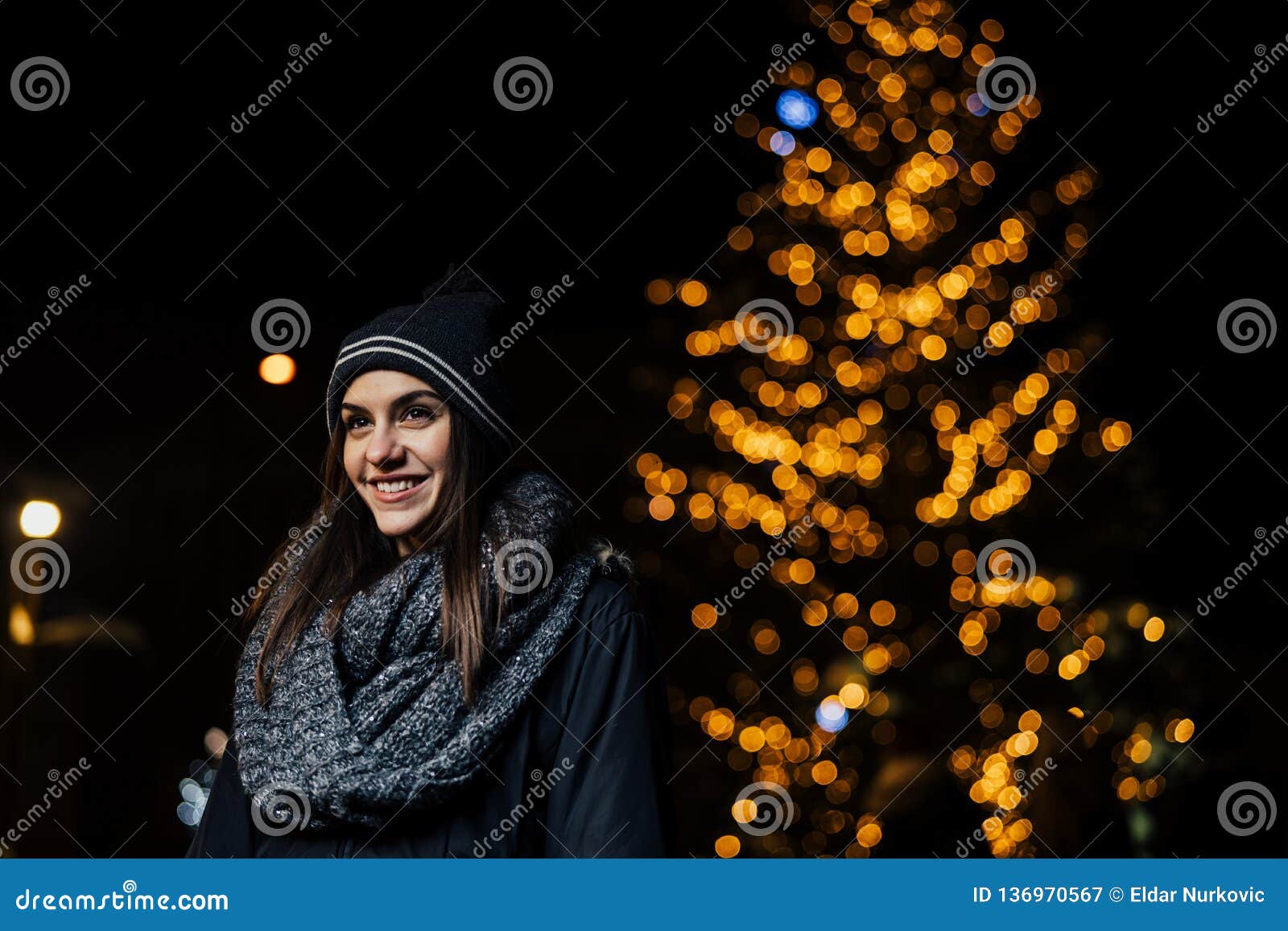 Night Portrait of a Beautiful Brunette Woman Smiling Enjoying Winter in ...