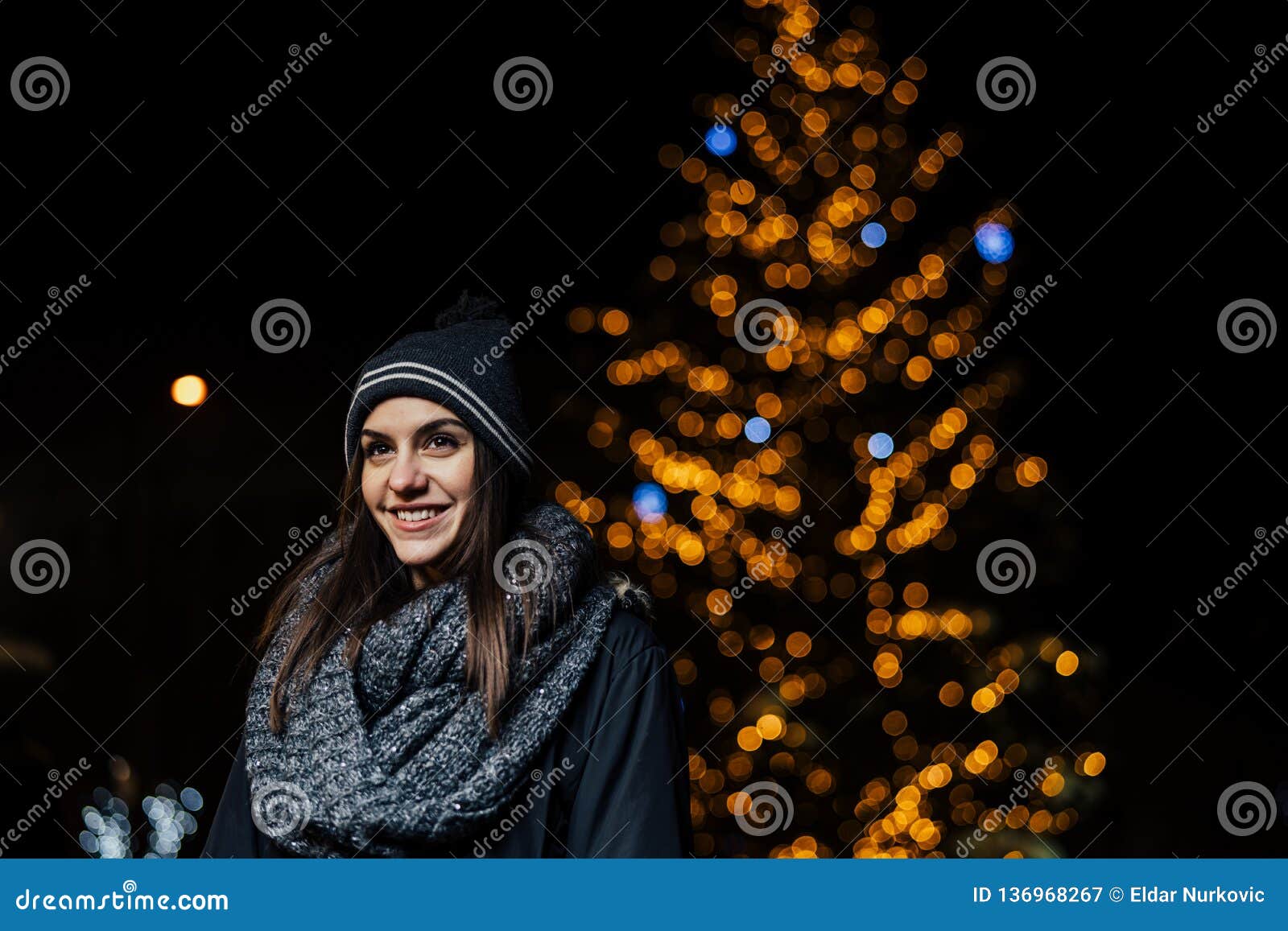 Night Portrait of a Beautiful Brunette Woman Smiling Enjoying Winter in ...