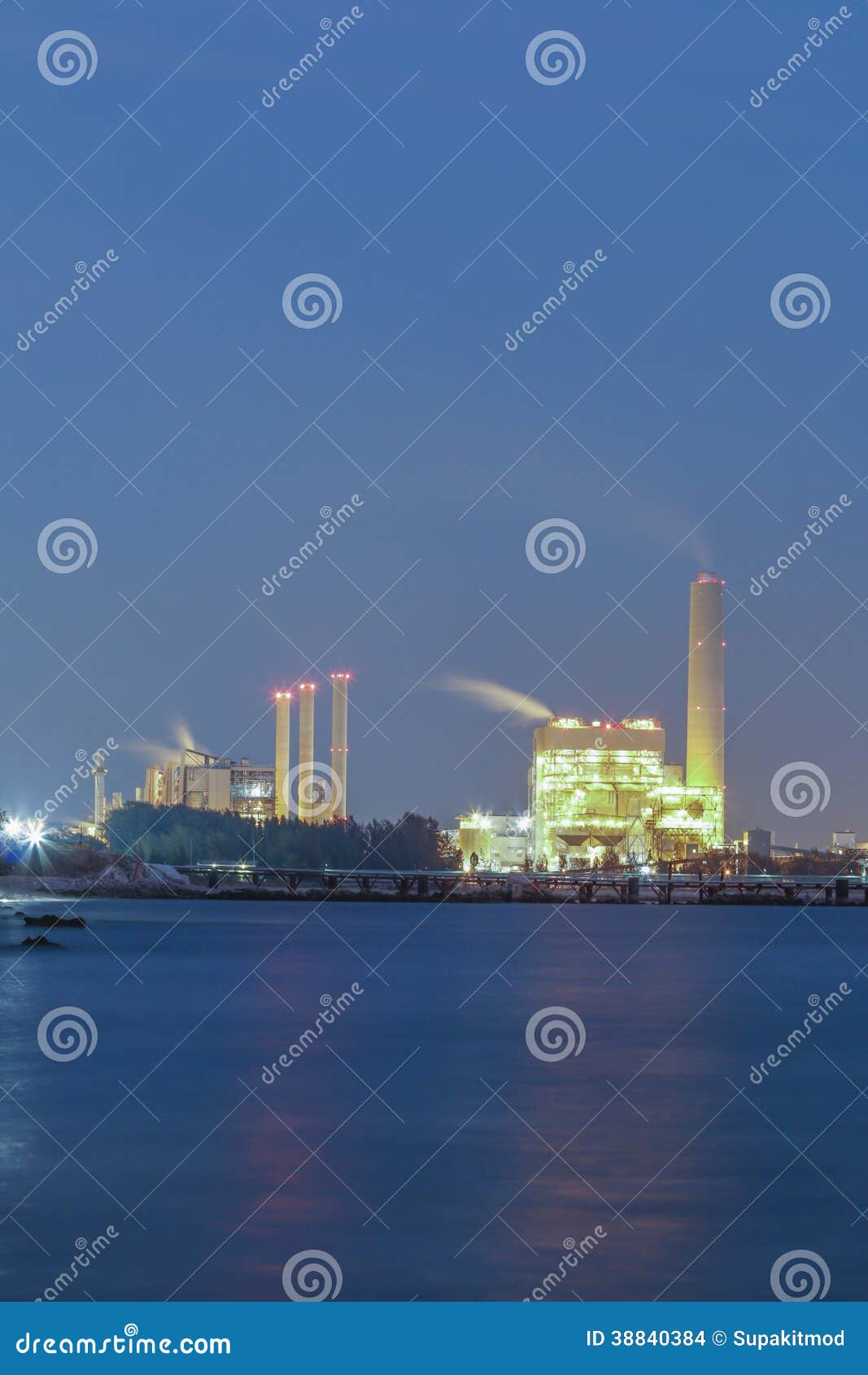 Night scene of Power plant with bay. Power plant with bay on night time