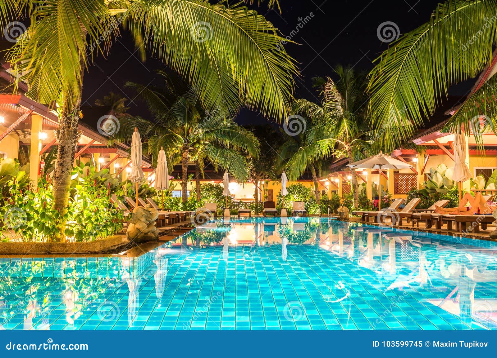 night view of beautiful swimming pool in tropical resort , phuket, thailand