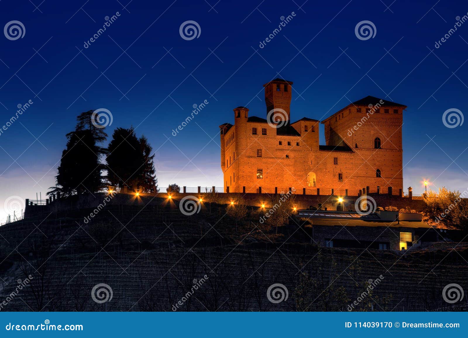 night view of the castle of grinzane cavour, in the langhe.