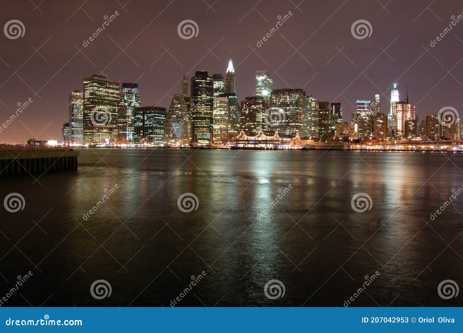 night view of the most emblematic buildings and skyscrapers of manhattan (new york). brooklyn bridge. river hudson.