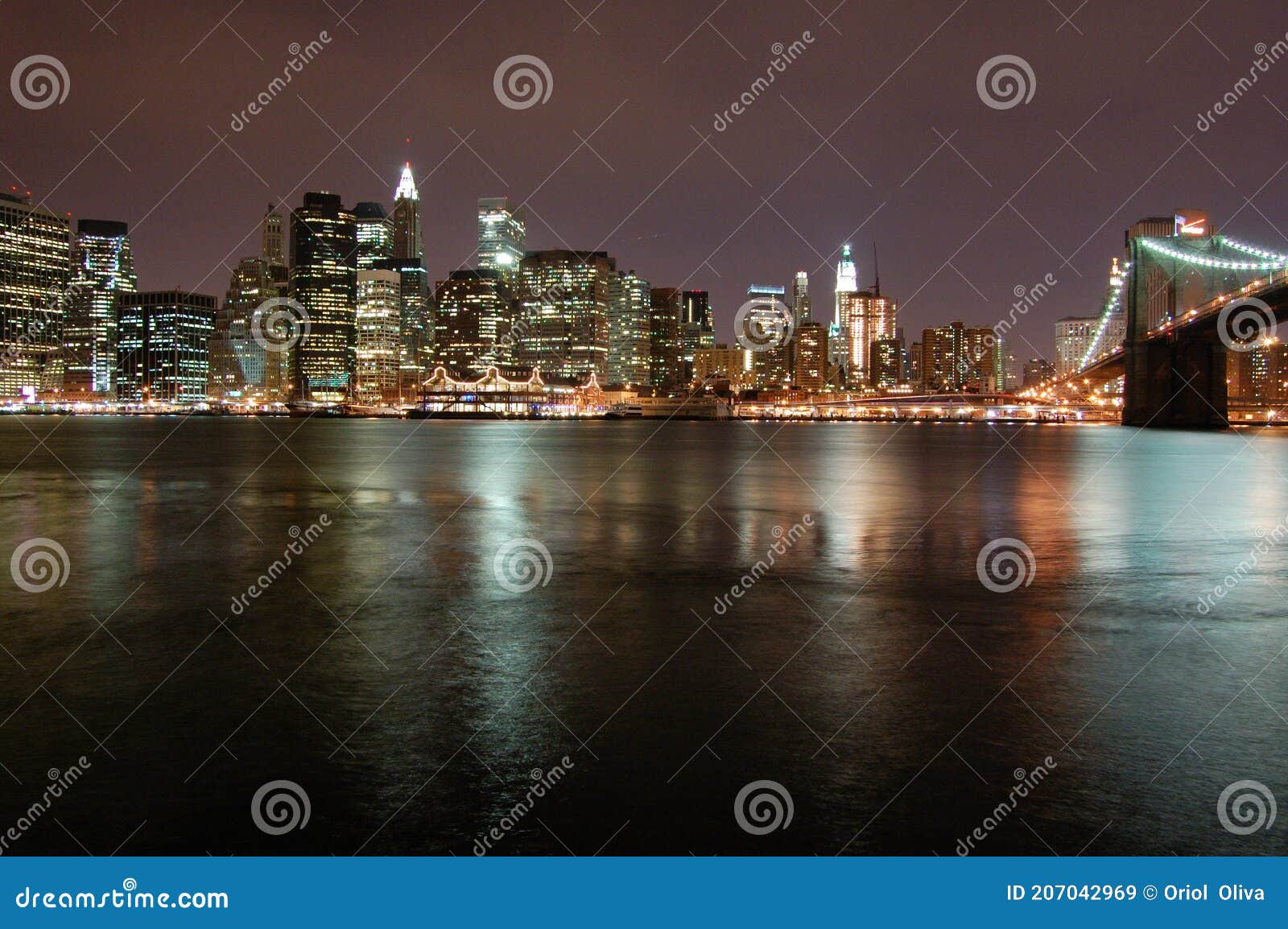 night view of the most emblematic buildings and skyscrapers of manhattan (new york). brooklyn bridge. river hudson.