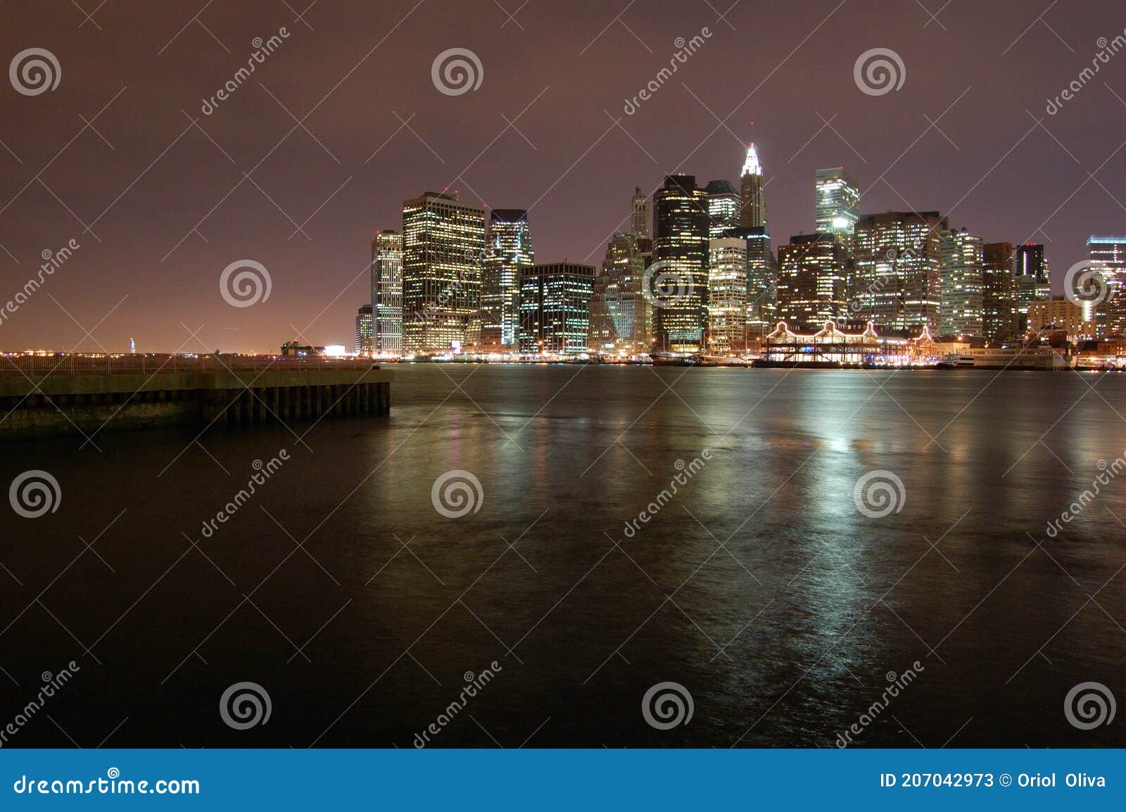 night view of the most emblematic buildings and skyscrapers of manhattan (new york). brooklyn bridge. river hudson.