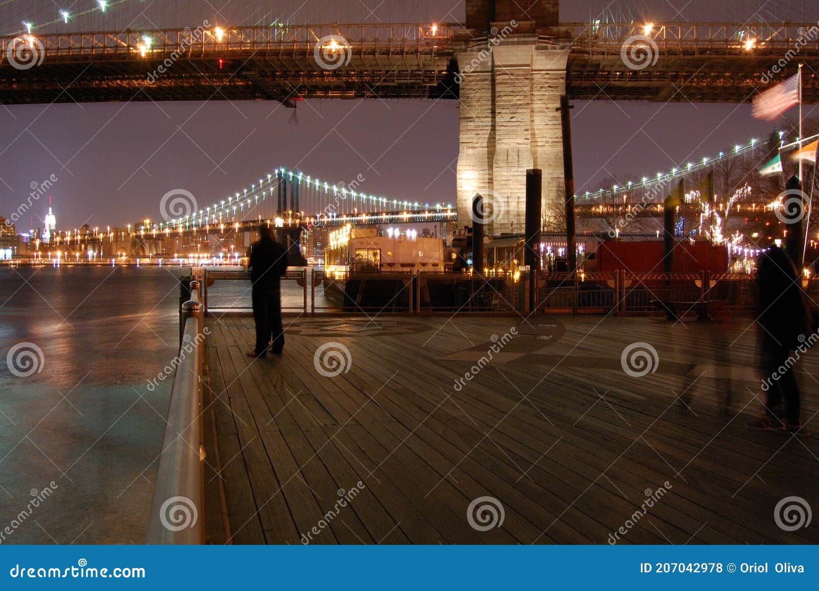 night view of the most emblematic buildings and skyscrapers of manhattan (new york). brooklyn bridge. river hudson.