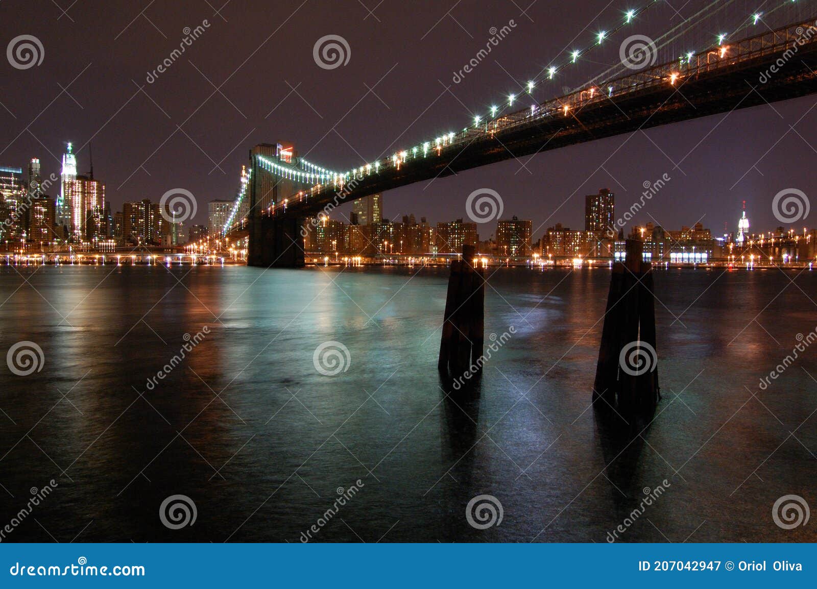 night view of the most emblematic buildings and skyscrapers of manhattan (new york). brooklyn bridge. river hudson.