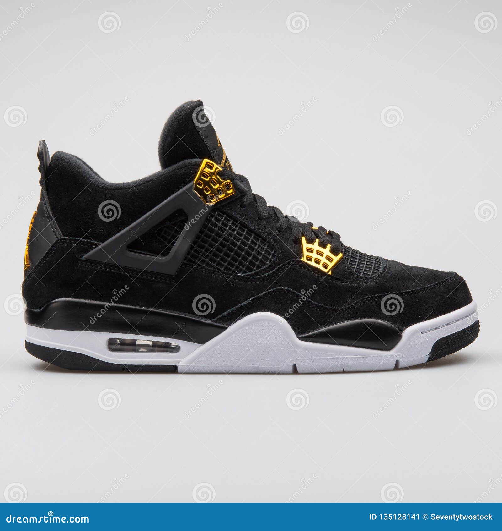 Nike Air Jordan 4 Black and Gold Sneaker Editorial Photo - Image of lifestyle, item: 135128141