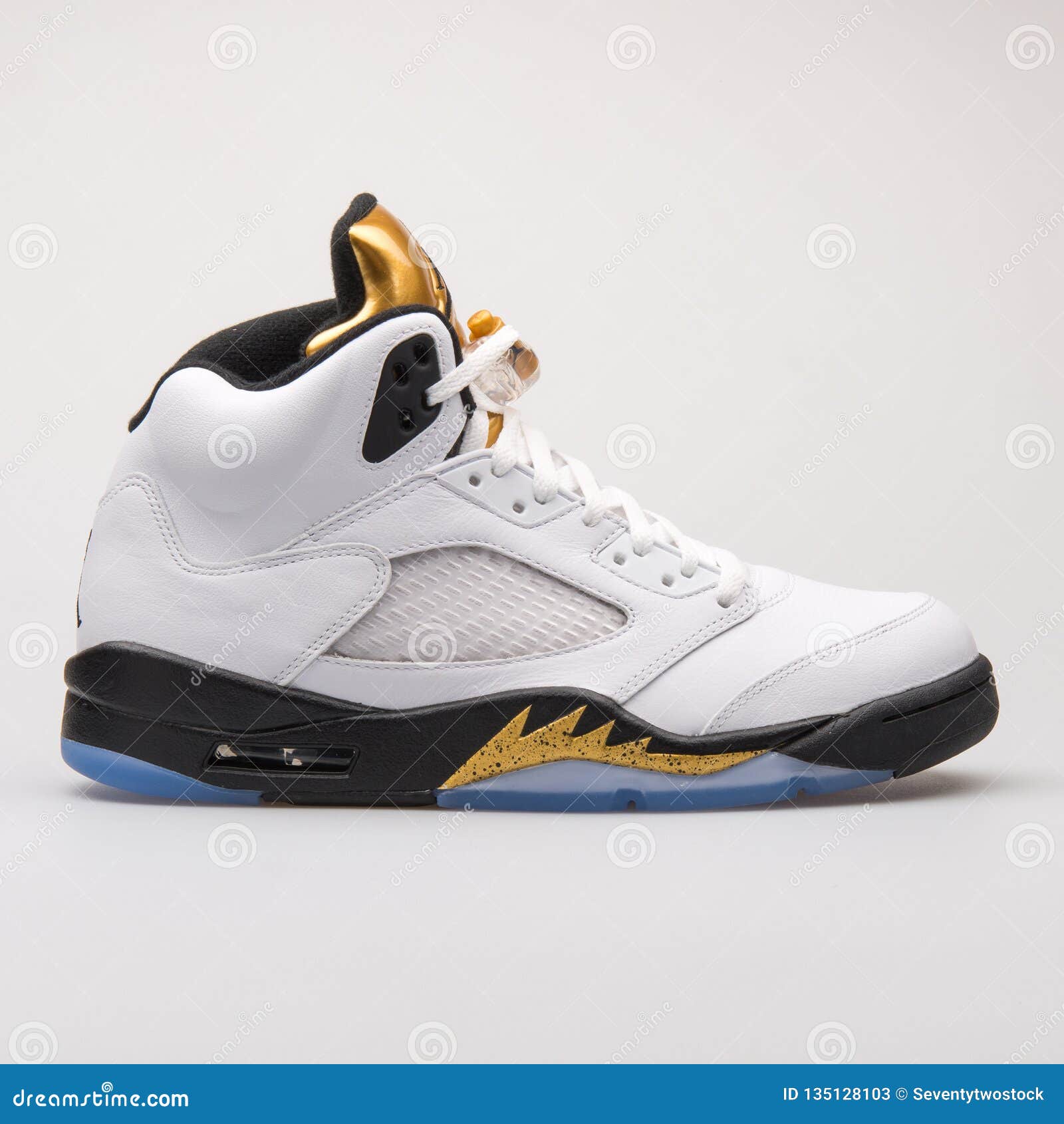 Nike Air Jordan 5 Retro White, Black and Gold Sneaker Editorial Stock Photo  - Image of accessories, color: 135128103