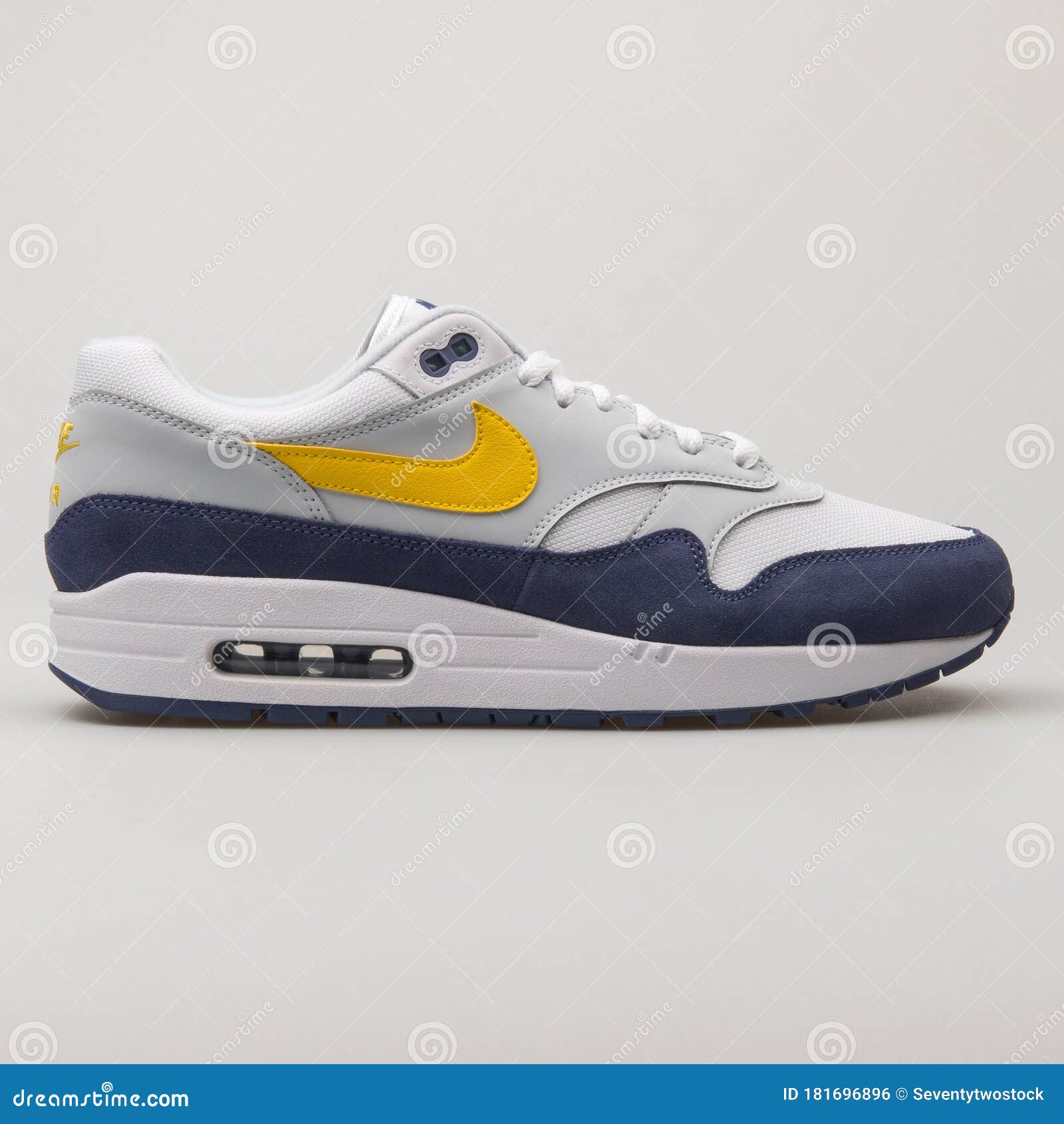 navy blue and yellow air max