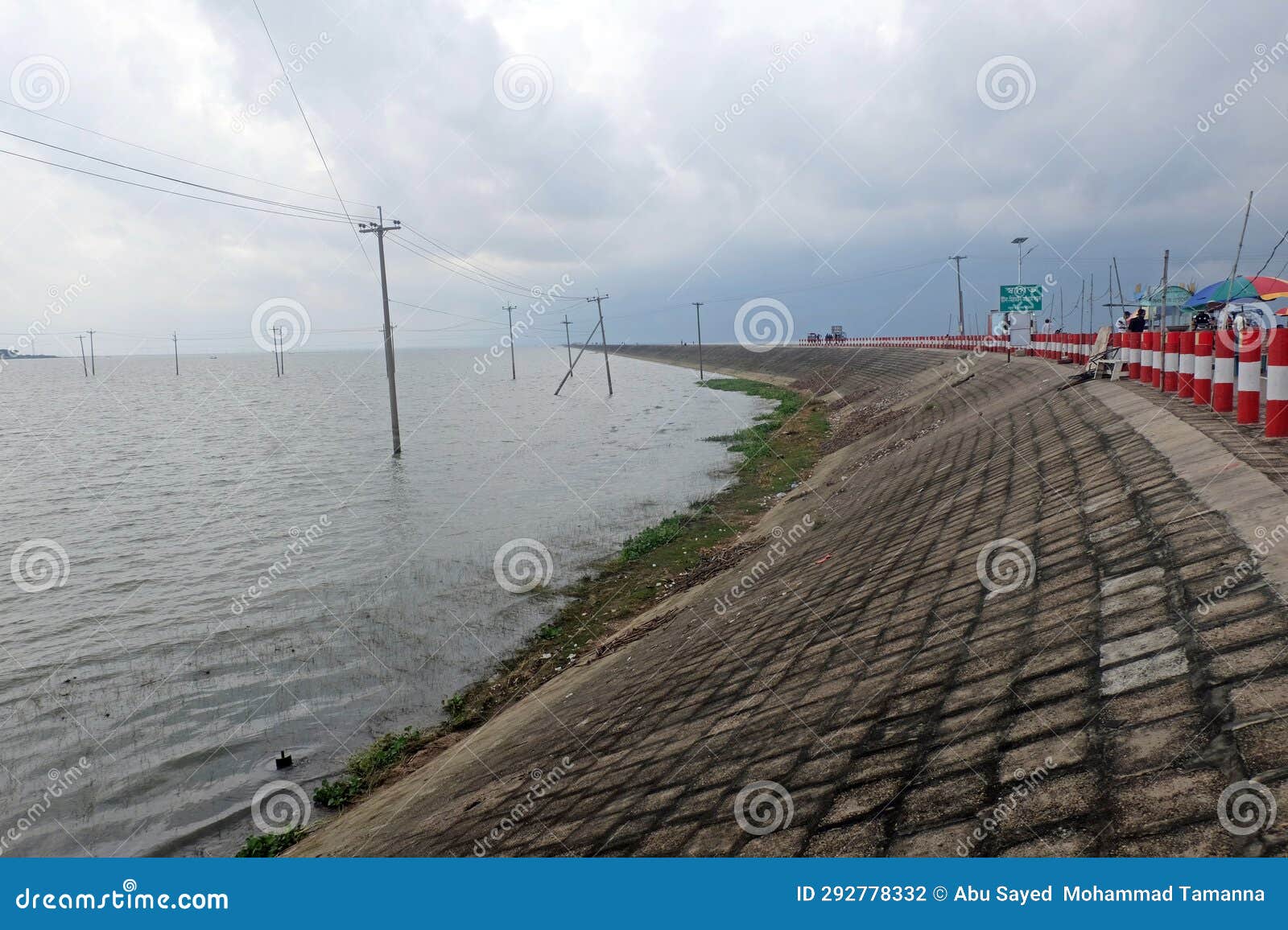 nikli kishoreganj is a mind-blowing road passing between water and sky on both sides