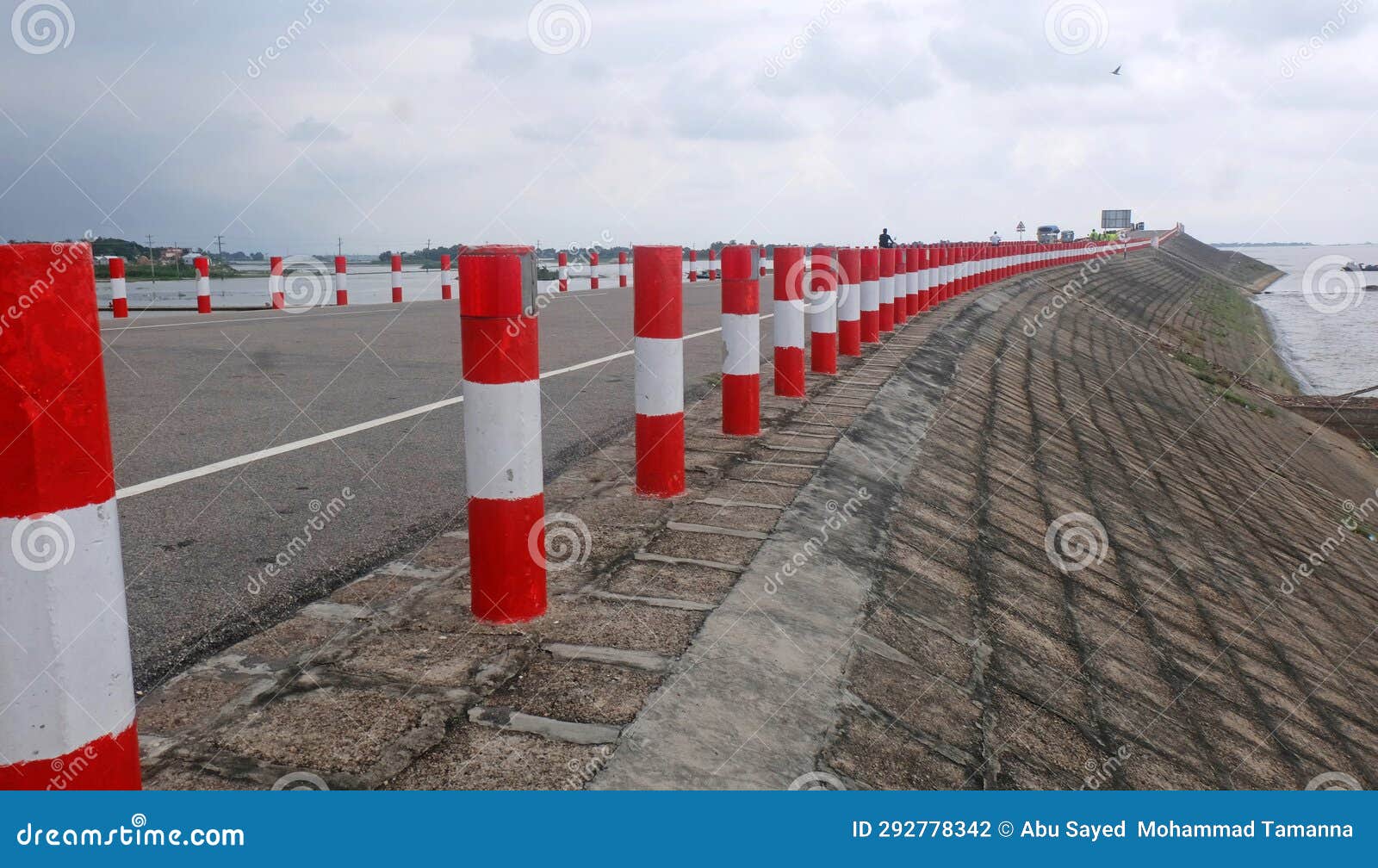 nikli kishoreganj is a mind-blowing road passing between water and sky on both sides