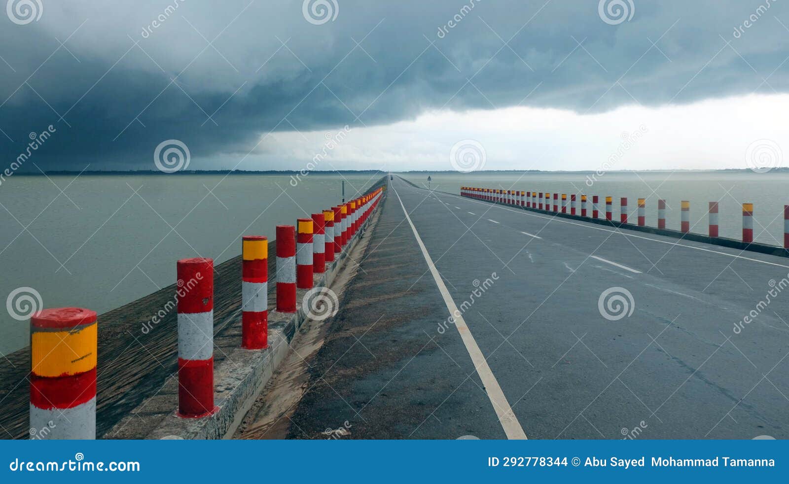 nikli kishoreganj is a mind-blowing road passing between water and sky on both sides