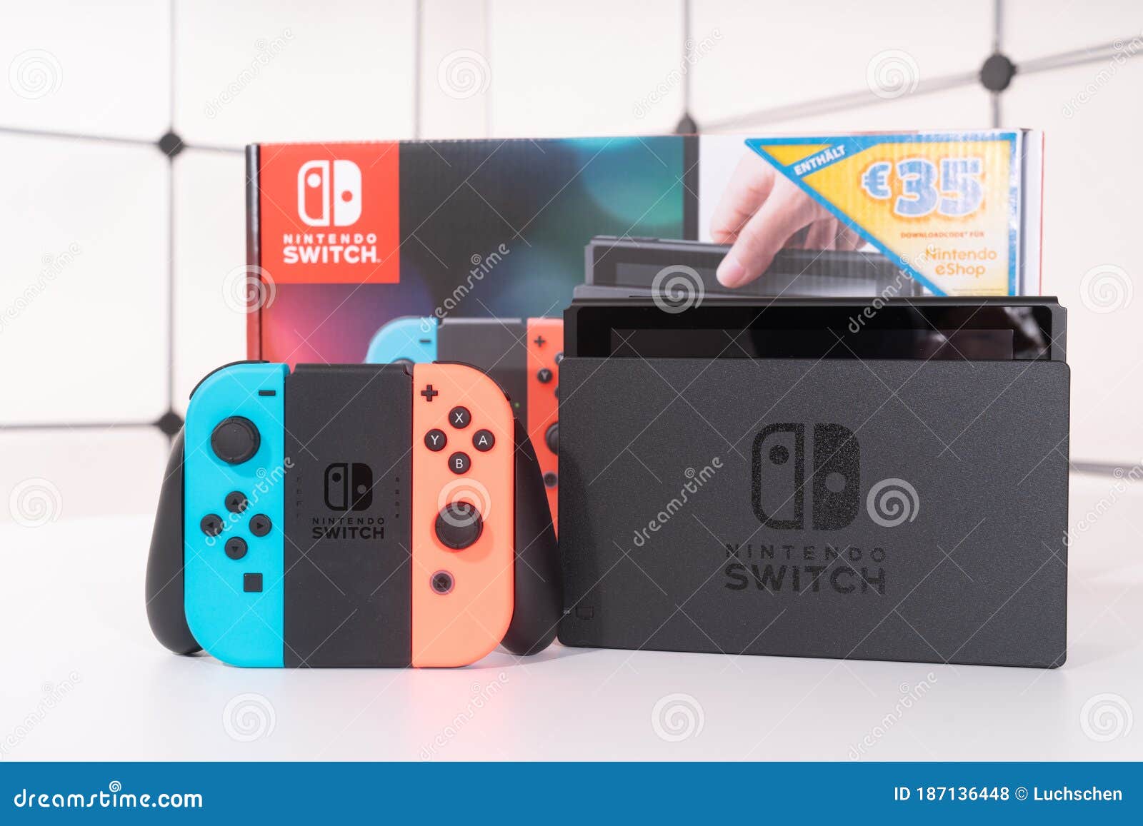 Nintendo Switch Video Game Console Developed by Nintendo, Released on March  3, 2017 on a White Background. Germany, Berlin - June Editorial Stock Photo  - Image of male, play: 187136448