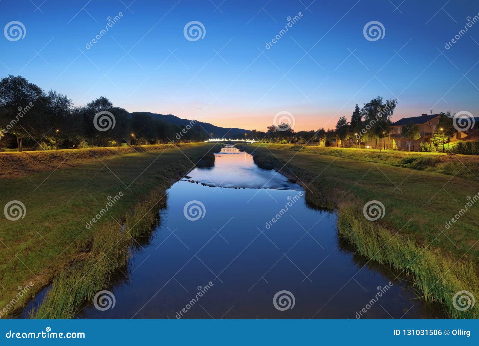 nisava river at twilight in pirot town, serbia