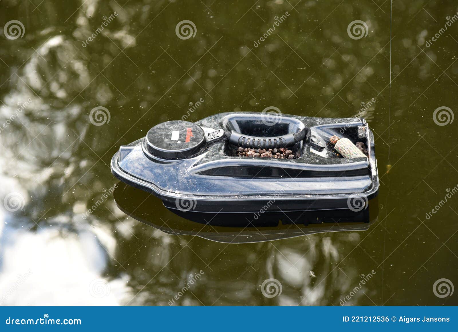 Nitaure, Latvia â€“ June 05, 2021: Gps Bait Boat for Fishing with Carp Bait  Floating on Water Editorial Photo - Image of controlled, accessories:  221212536