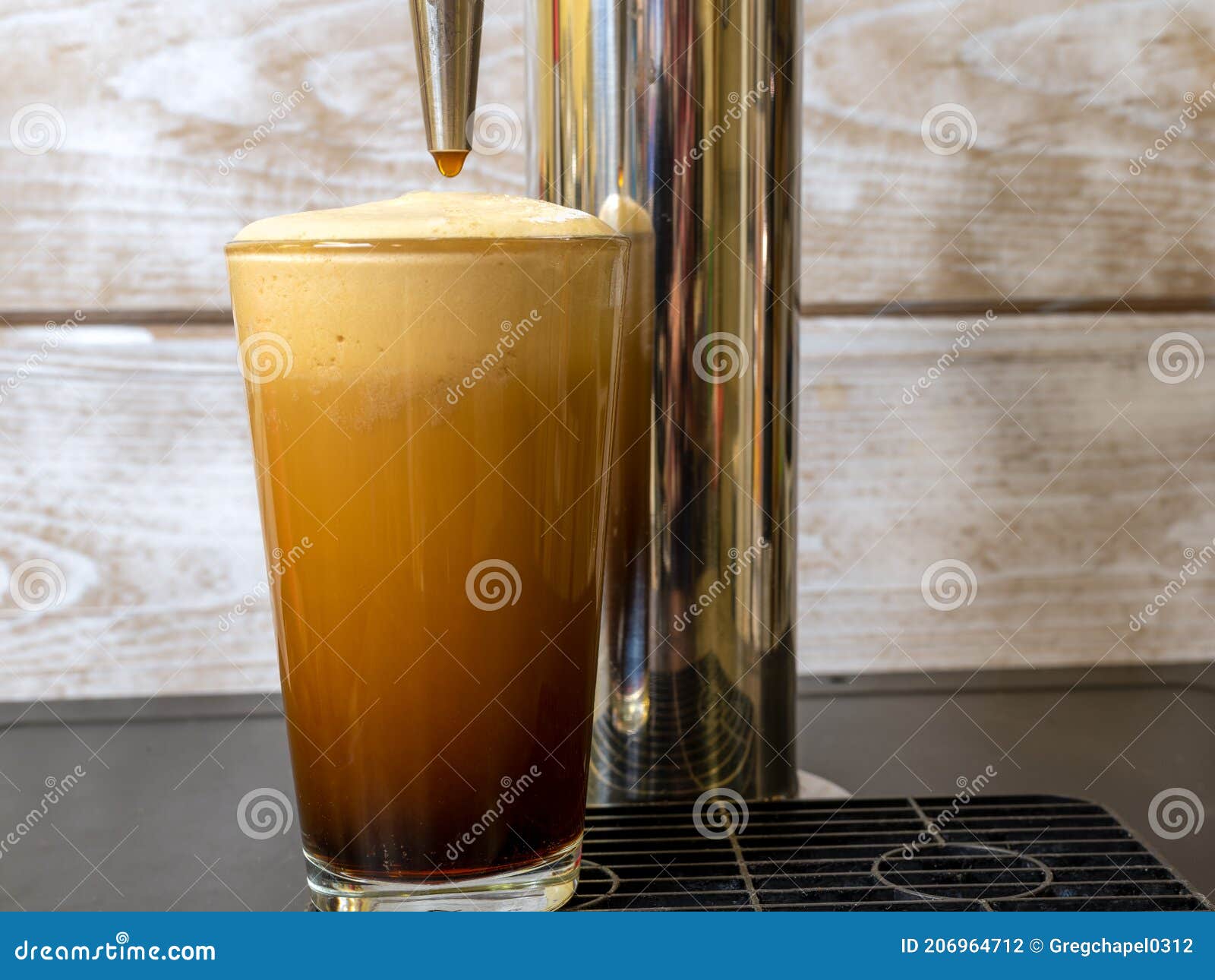 nitro cold brew coffee in a clear glass