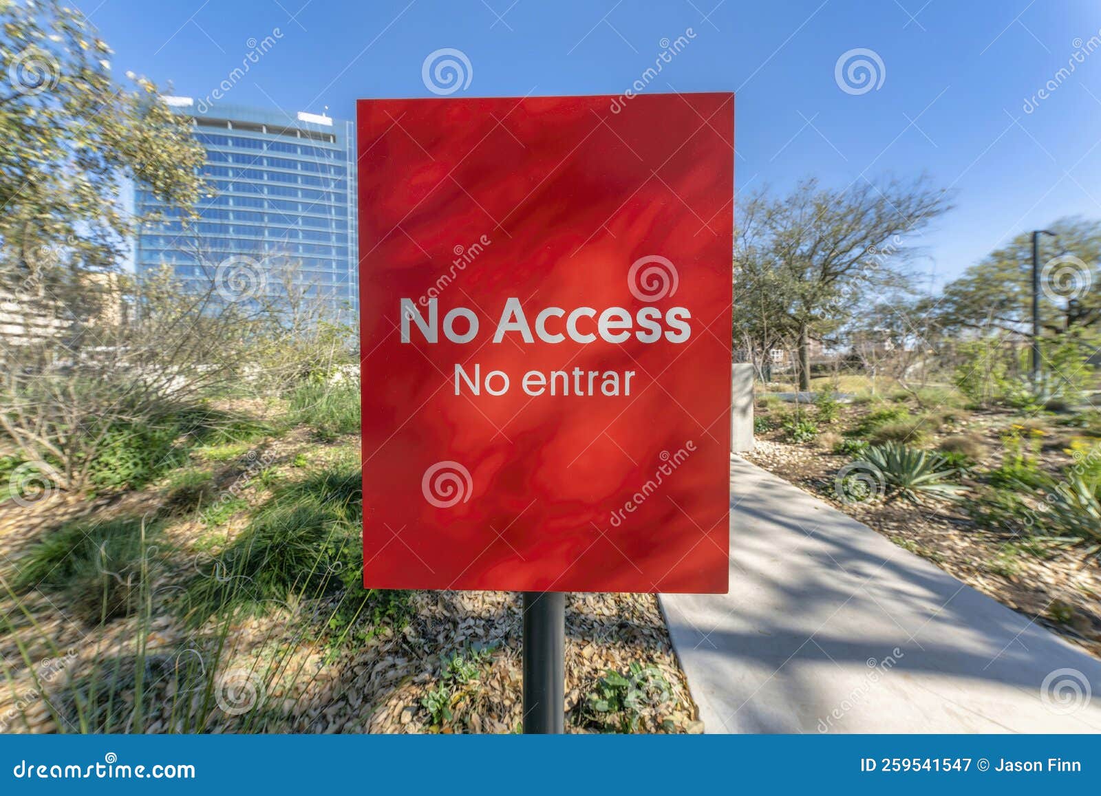 no access signage by a paved walking trail at waterloo park austin texas