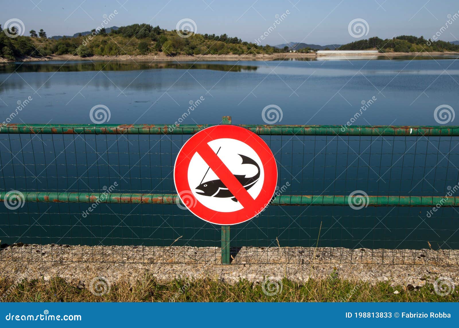 no fishing sign on giacopiane lake, an artificial reservoir located in the sturla valley in the municipality of borzonasca, inland