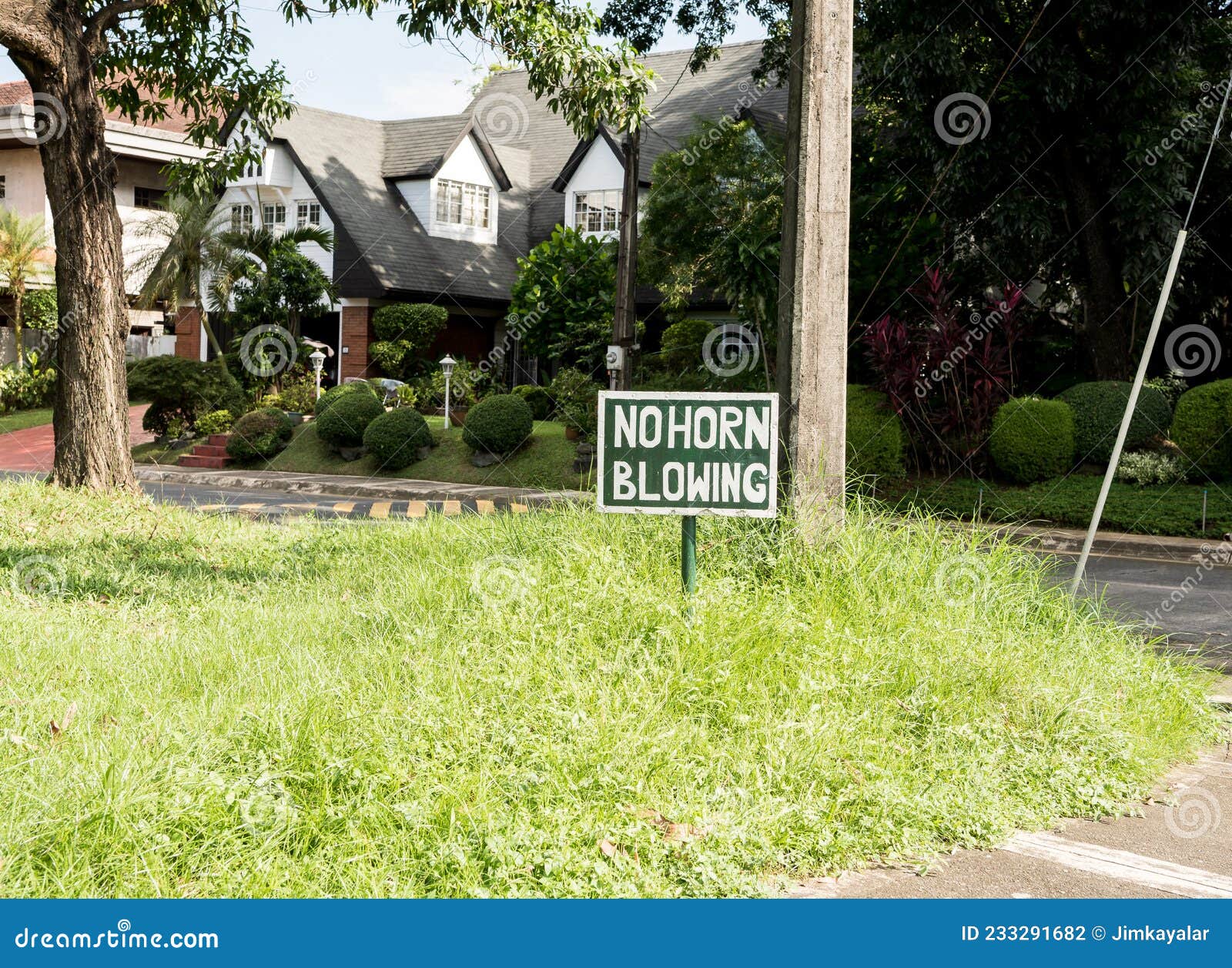 A `No Horn Honking` Sign at an Intersection Stock Photo Image of hills, commerical 233291682