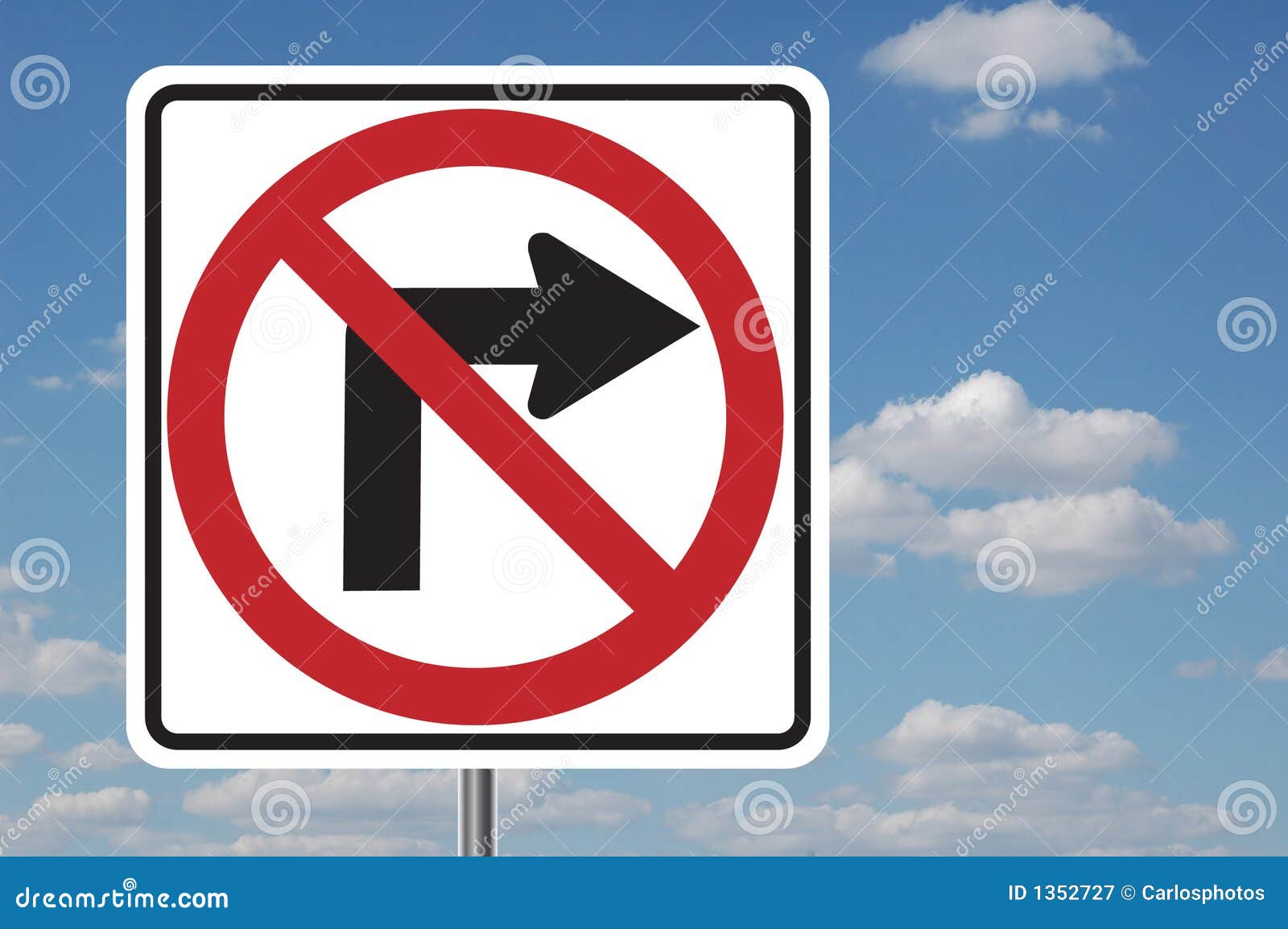 no right turn sign with clouds