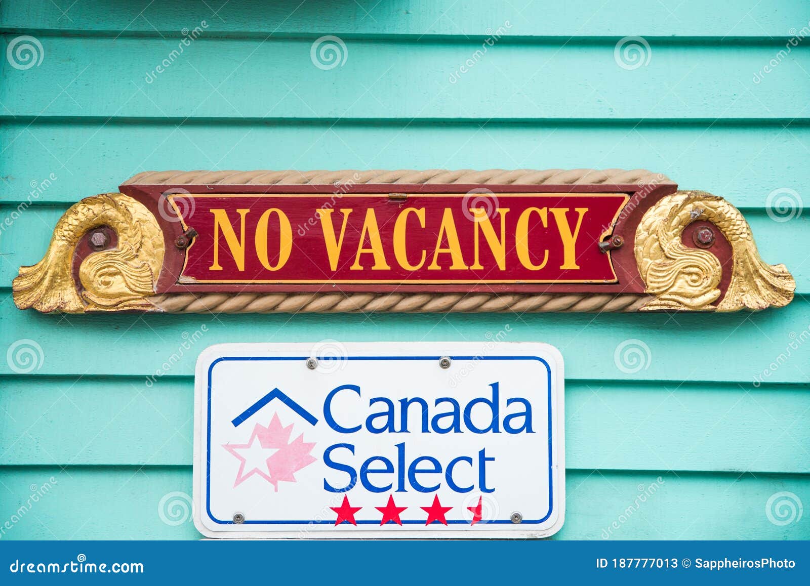 No Vacancy Retro Sign on Turquoise Wall. Fully Booked Hotel Editorial