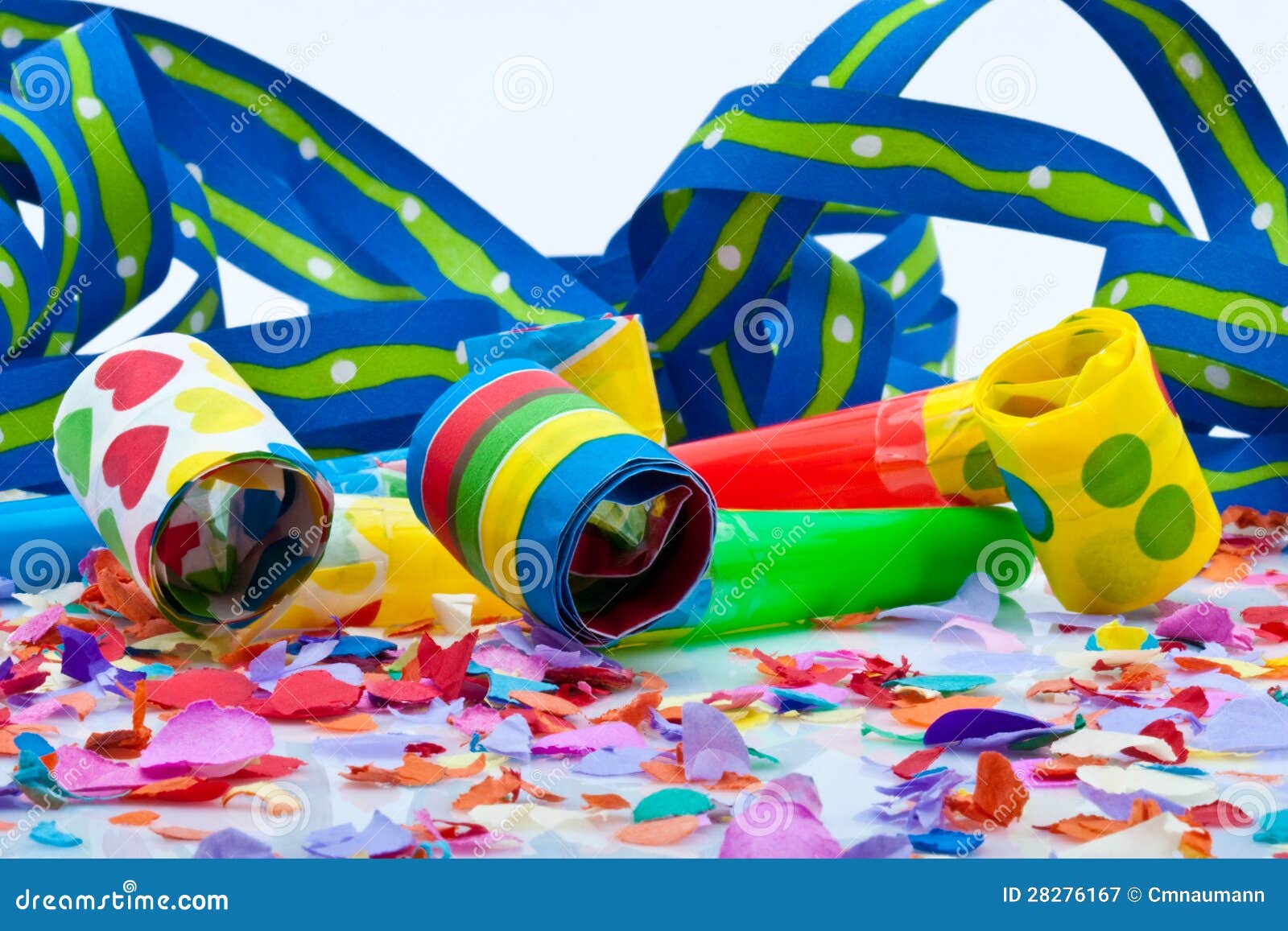 Noisemakers for a Party on White Background with Air Streamers and