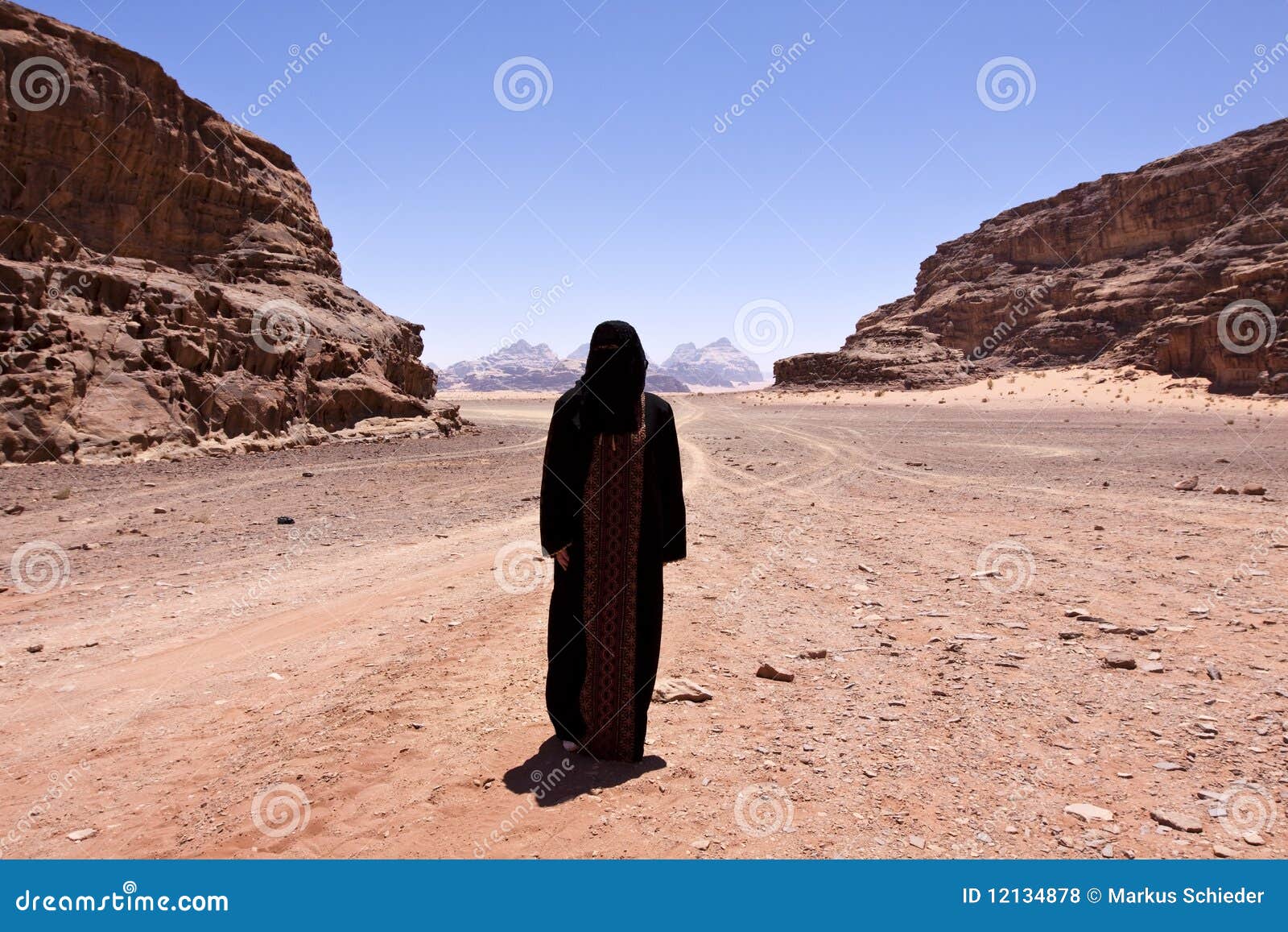 nomadic woman with burka in wadi rum