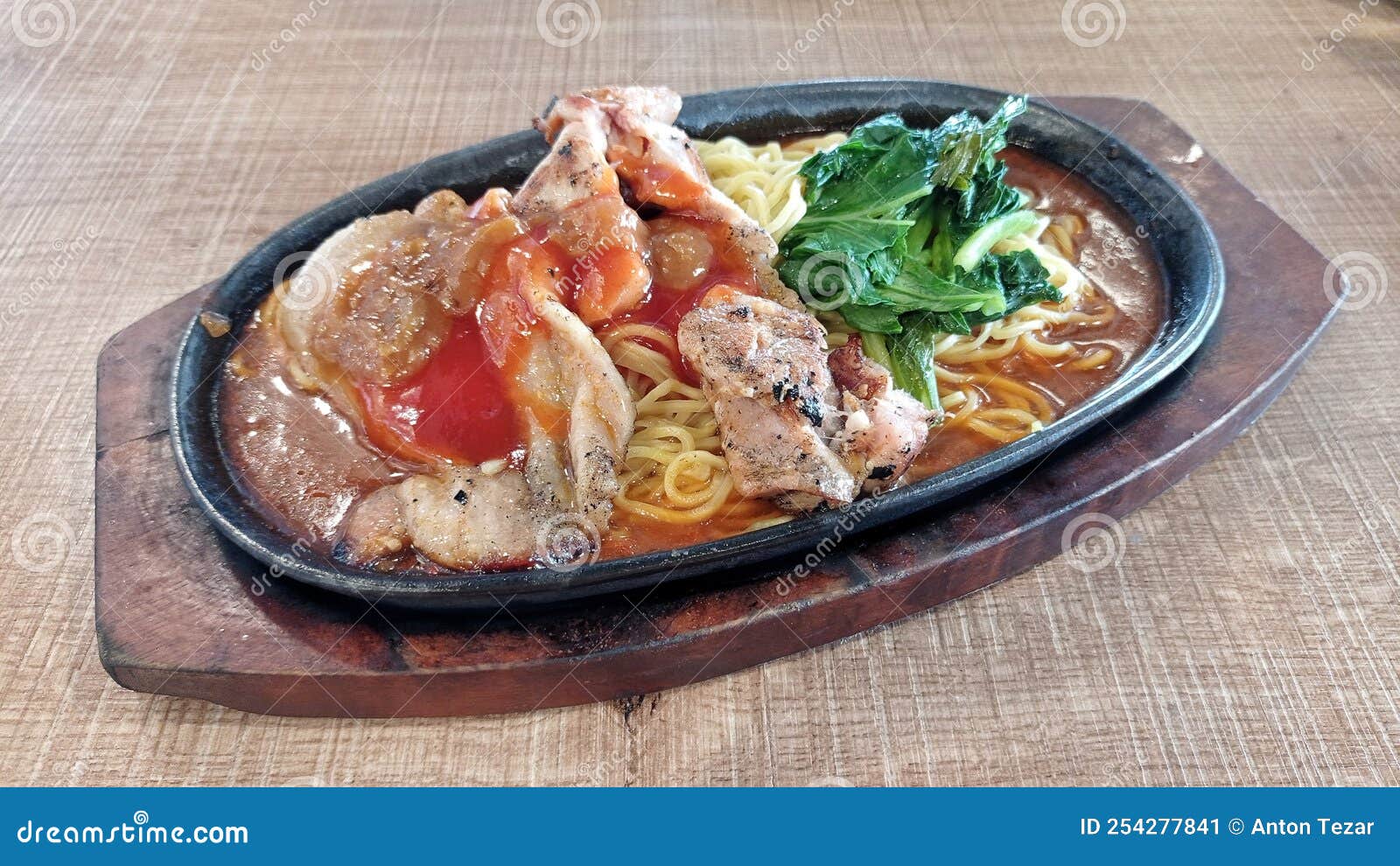 Noodle in hot plate stock image. Image of curry, soup 254277841